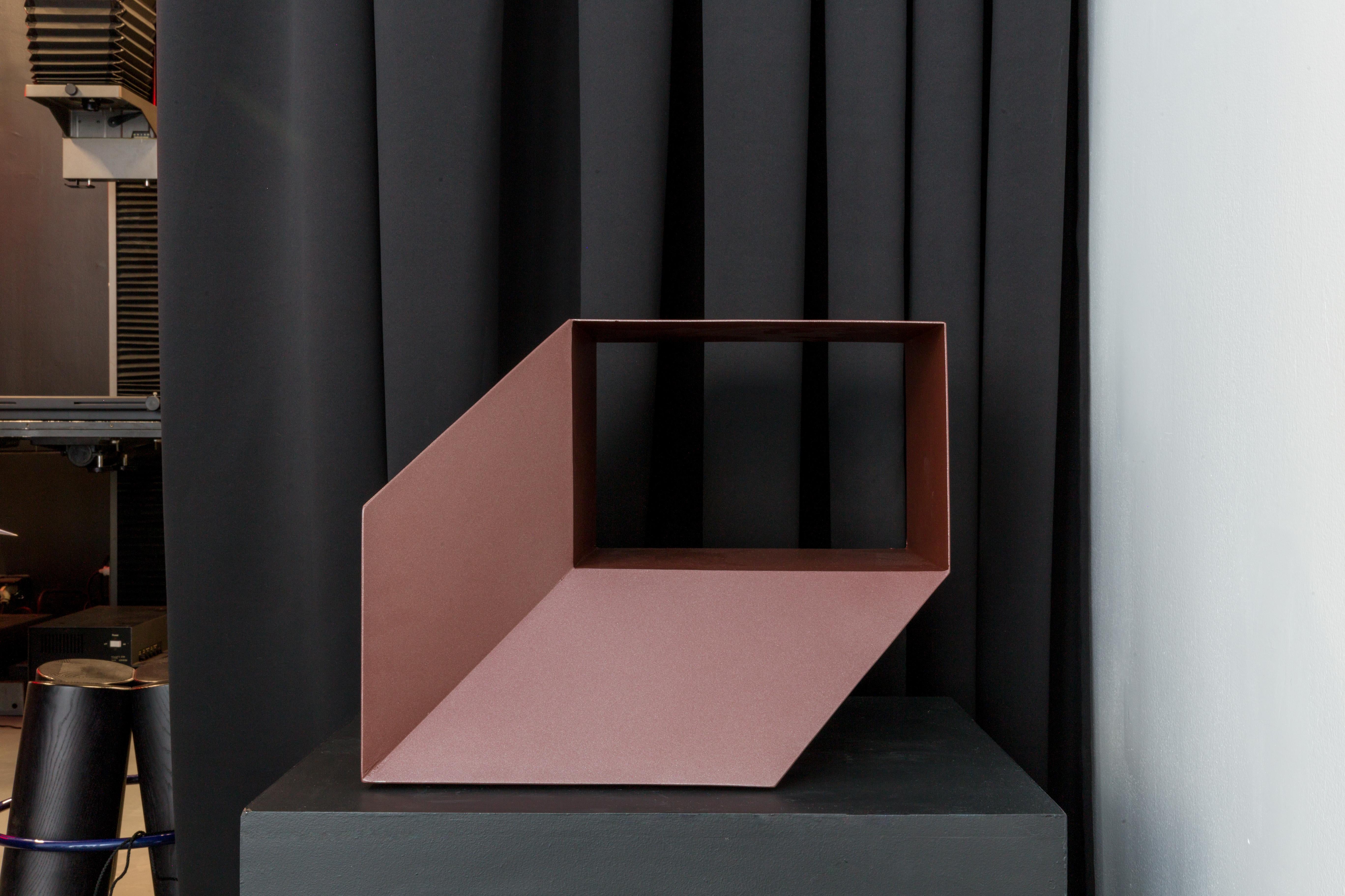 Rocky is a sculptural piece. It can be used as a console or a credenza, but will also accommodate books and objects to become the most graphic display or bookshelf.

Designer Charles Kalpakian plays with our perception of space and volume with an