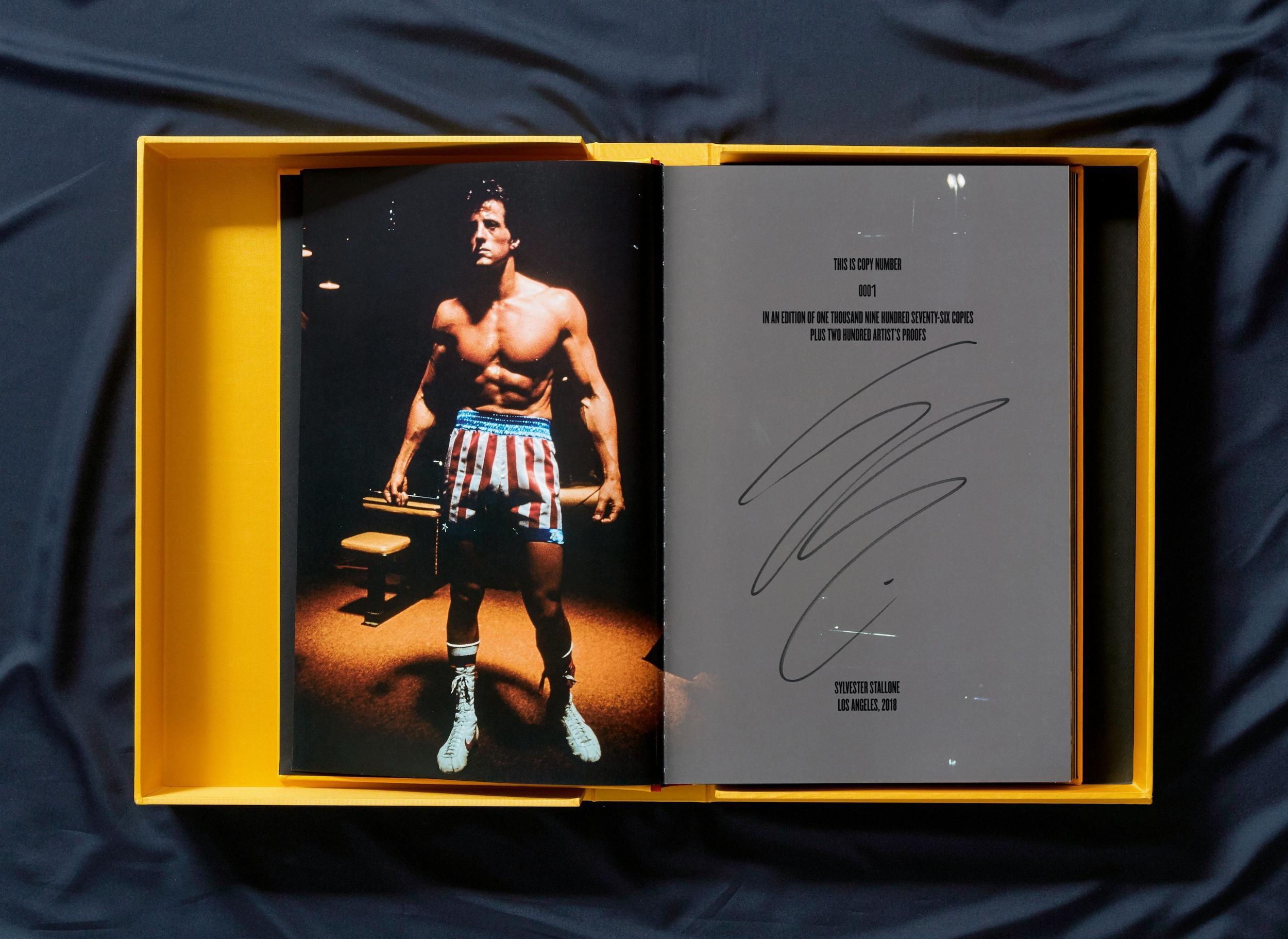 Edition of 1,926.
Hardcover in a clamshell box, 11.4 x 17.3 in., 24.5 lb, 380 pages, each numbered and signed by Sylvester Stallone; with a print of Stallone’s painting 'Finding Rocky' (1975), and a 36-page 'Rocky' notebook facsimile, 8 x 11