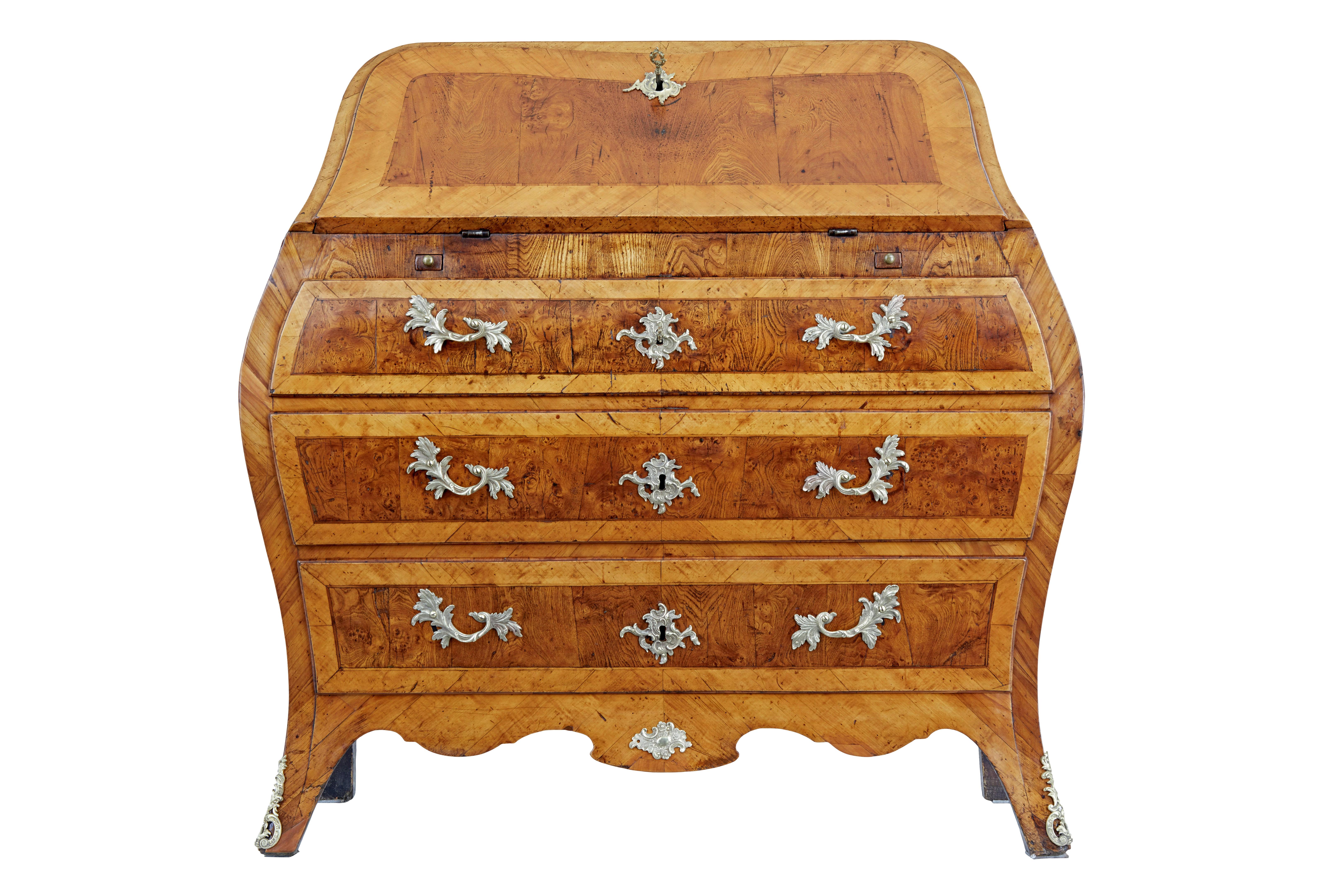 Rococo 18th century yew and elm bureau desk circa 1750.

Stunning swedish rococo period bombe shaped bureau.   Beautifully made from yew wood and elm, using various techniques such as parquetry, inlay and cross banding.

Top surface and sides