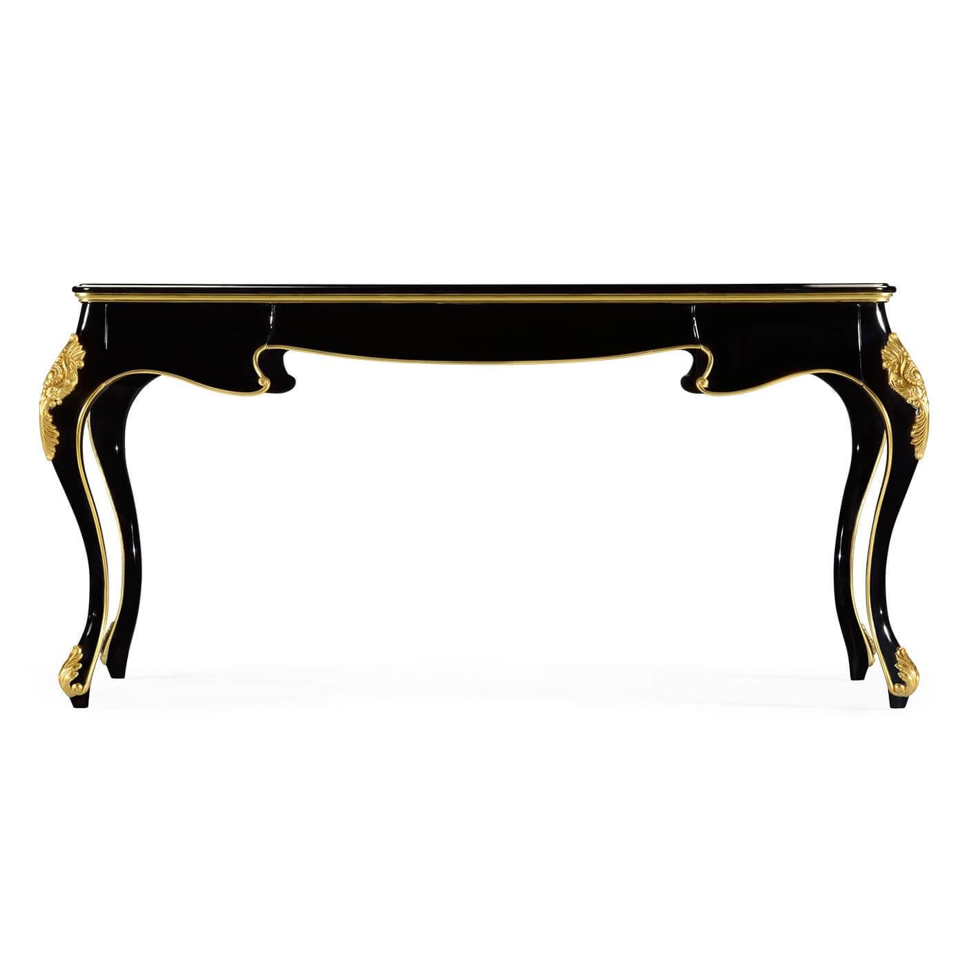 An English Rococo black lacquered desk with gilt-tooled red leather top, carved and gilded decorations with three shaped frieze drawers and cabriole legs. 

Dimensions: 62.5