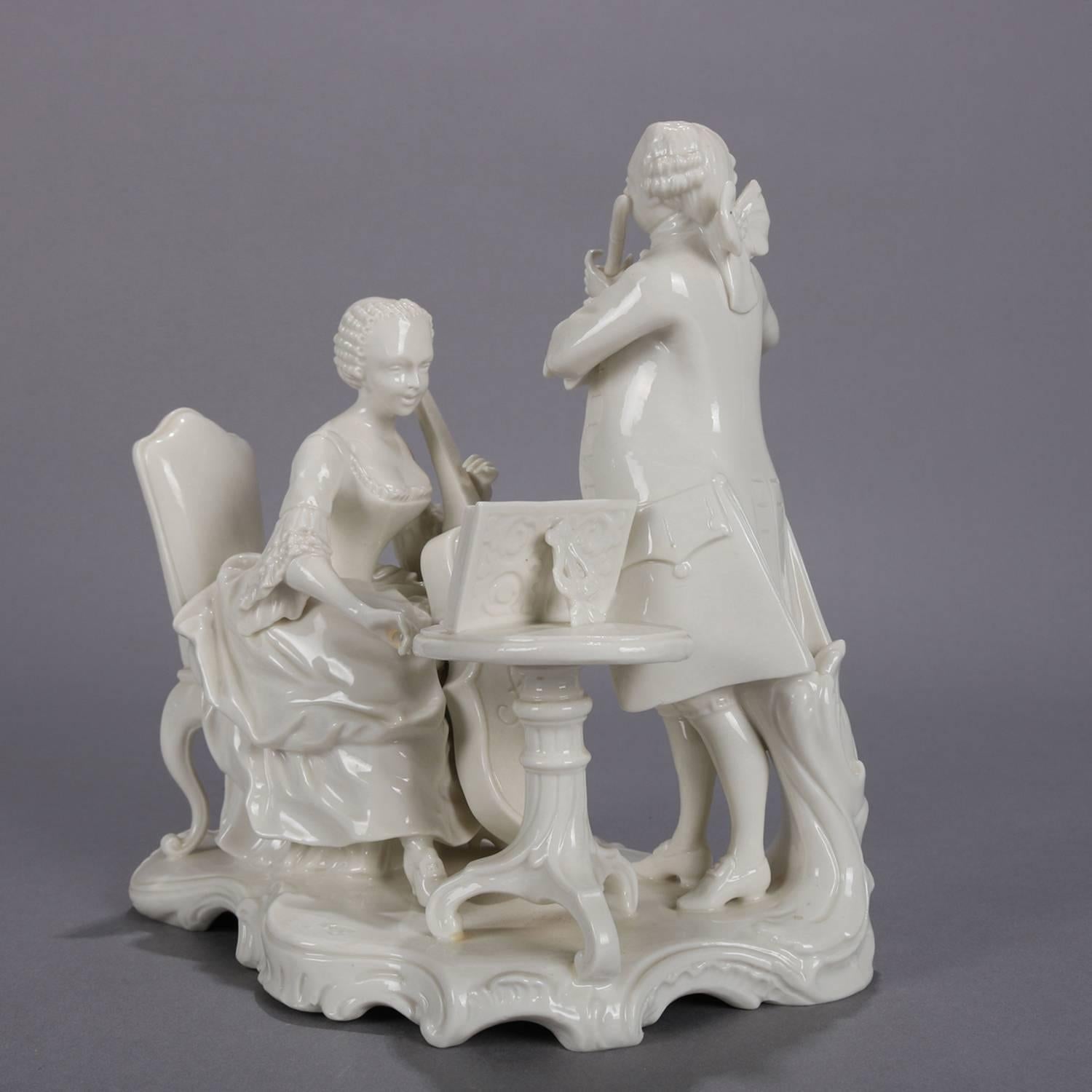 Rococo Blanc de Chine porcelain figural group features musicians including seated Cello payer and violinist on scroll and foliate from base, crown stamp on base, circa 1880.


Measures: 9