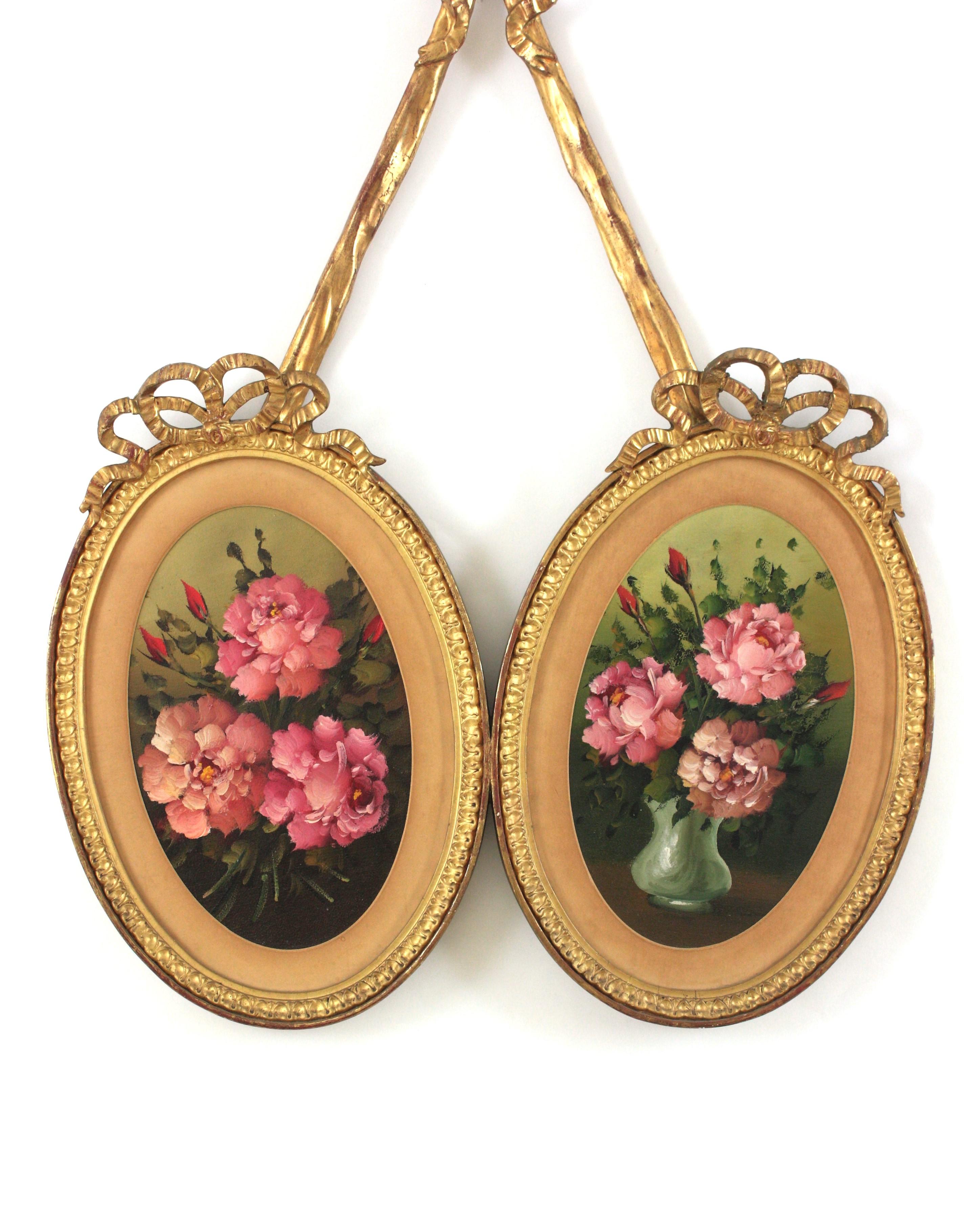 Rococo Cadre double ovale rococo en bois doré avec peintures florales en vente