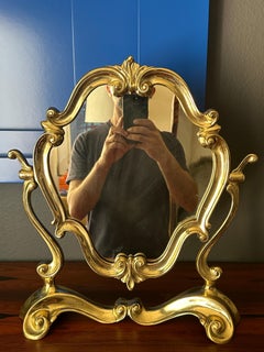 Miroir de courtoisie en laiton Rococo
