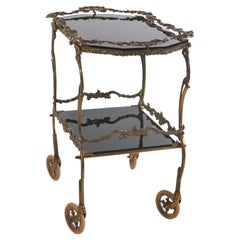 Carrito de bar rococó de latón fundido y cristal negro con bandeja extraíble