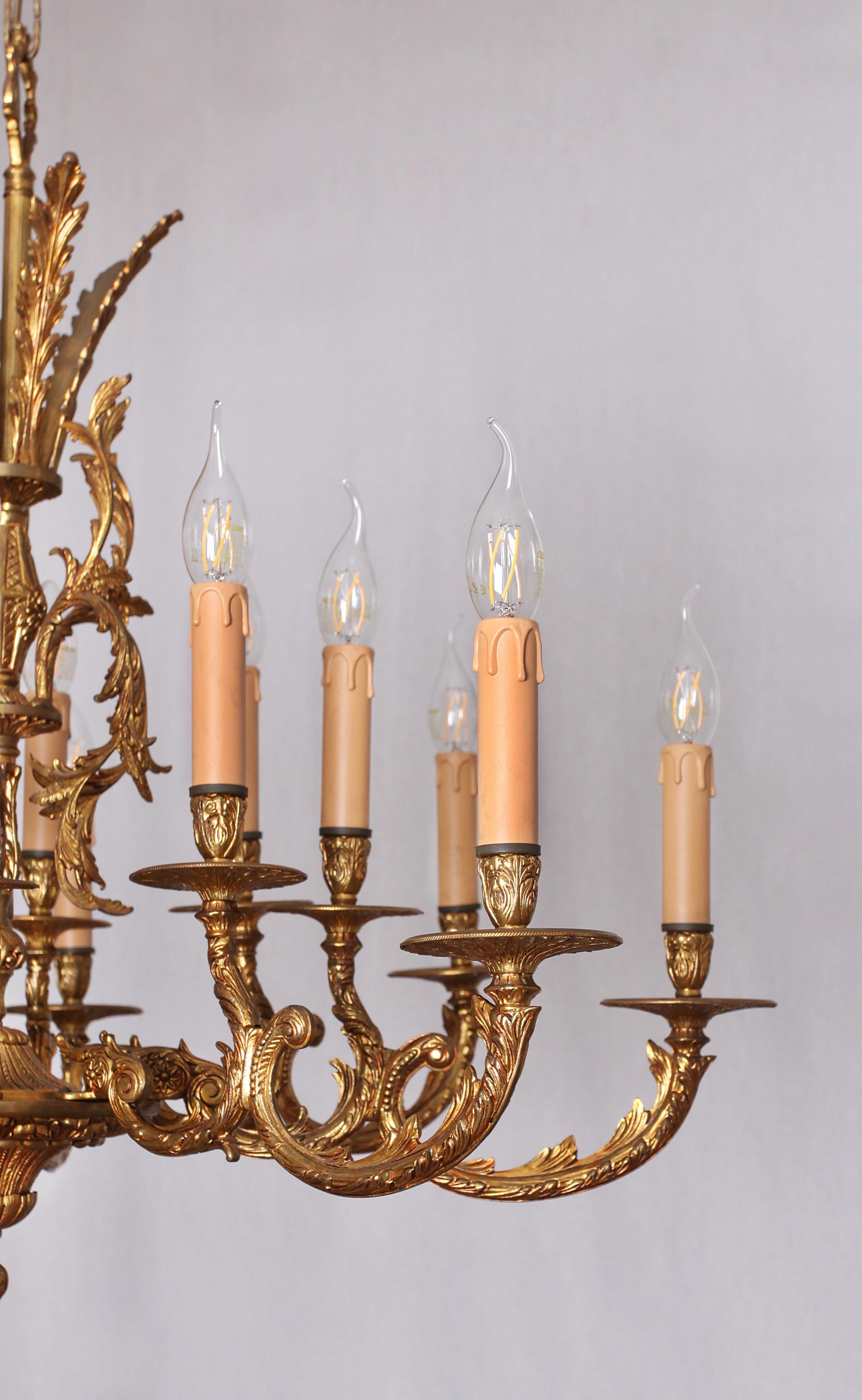 French Rococo chandelier made of polished brass 16 bulbs For Sale
