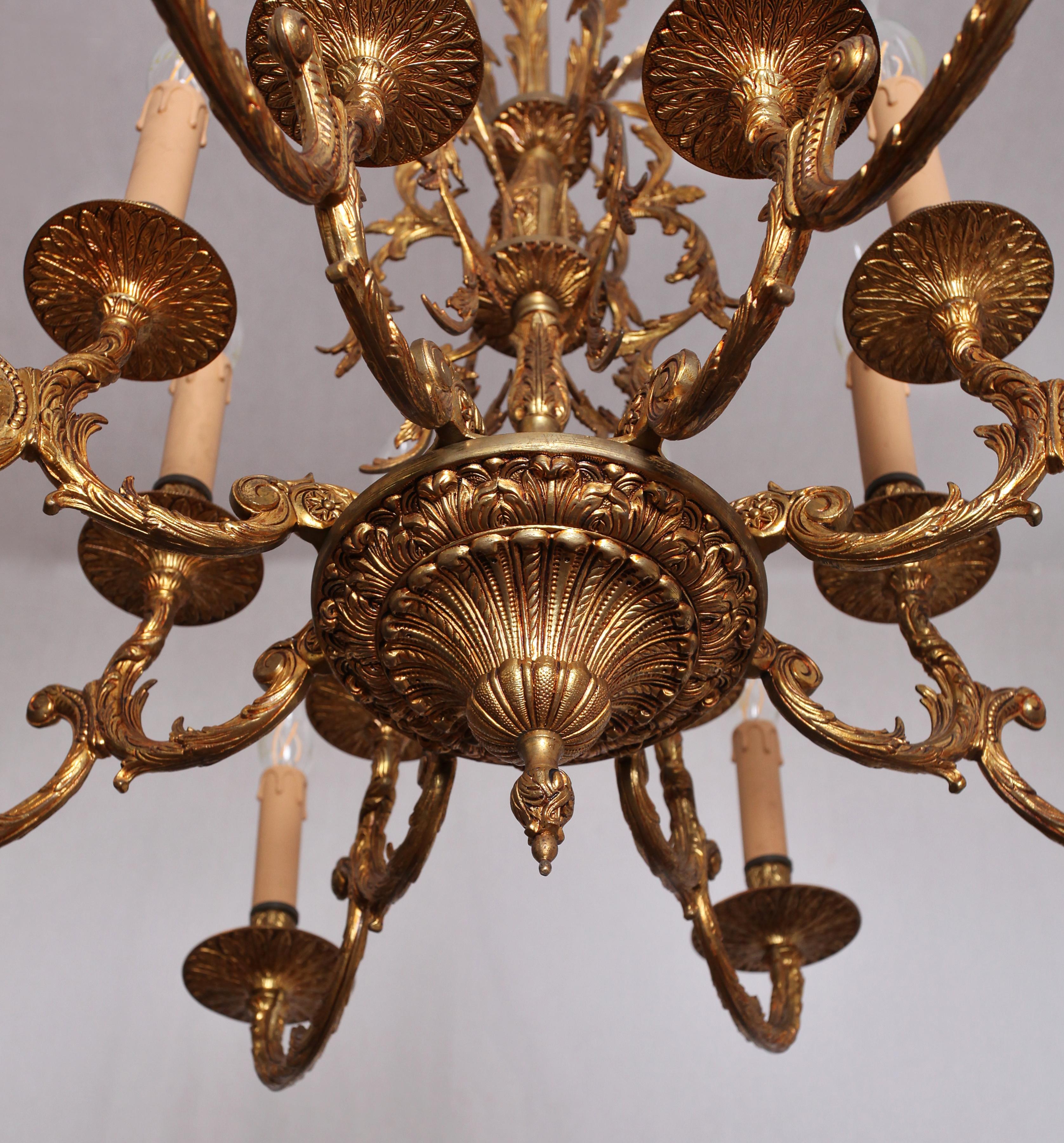 Polished Rococo chandelier made of polished brass 16 bulbs For Sale
