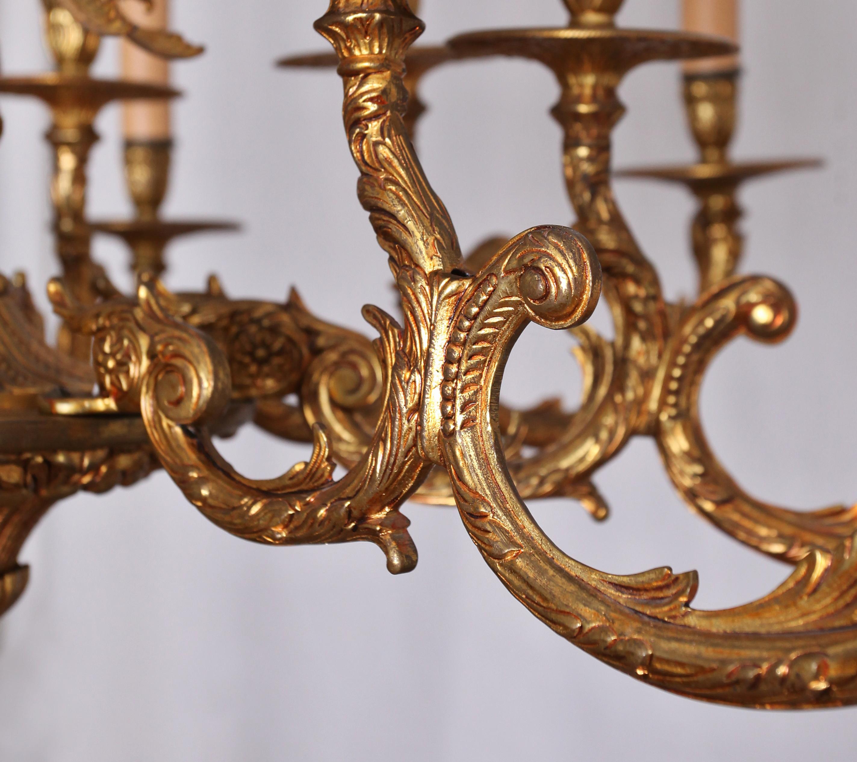 Mid-20th Century Rococo chandelier made of polished brass 16 bulbs For Sale