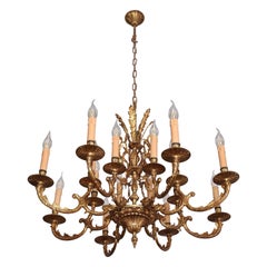 Rococo chandelier made of polished brass 16 bulbs