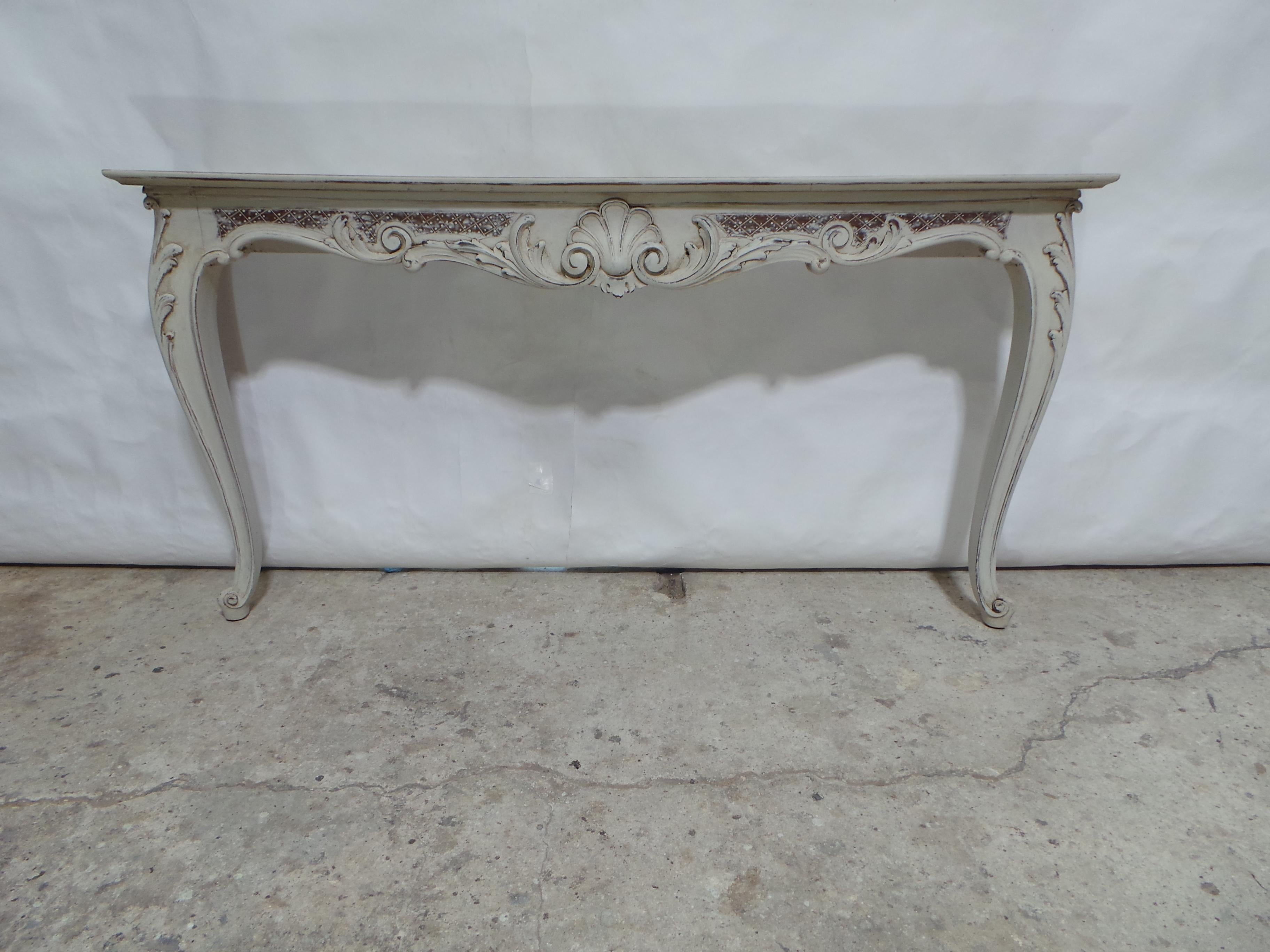 This is a unique Rococo style wall mount console table. its been restored and repainted with Milk Paints 