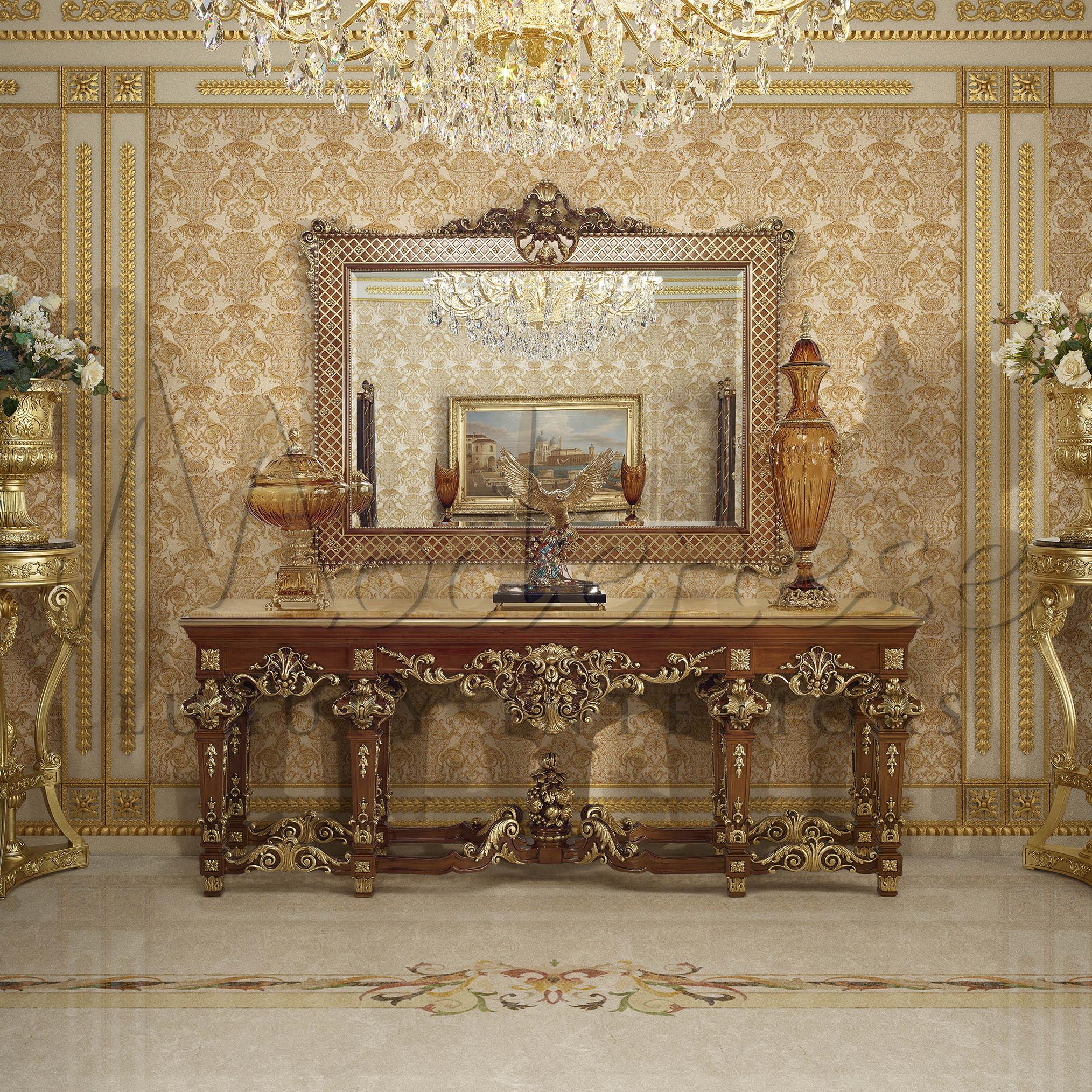 Decorate your private villa living with a fully customizable rococo console. This particular model features a natural walnut finishing with handmade carvings later hand decorated with gold leaf applications and cappuccino onyx for the top. Modenese
