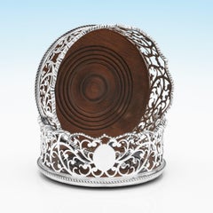 Rococo design George III period sterling silver wine coasters made in 1769