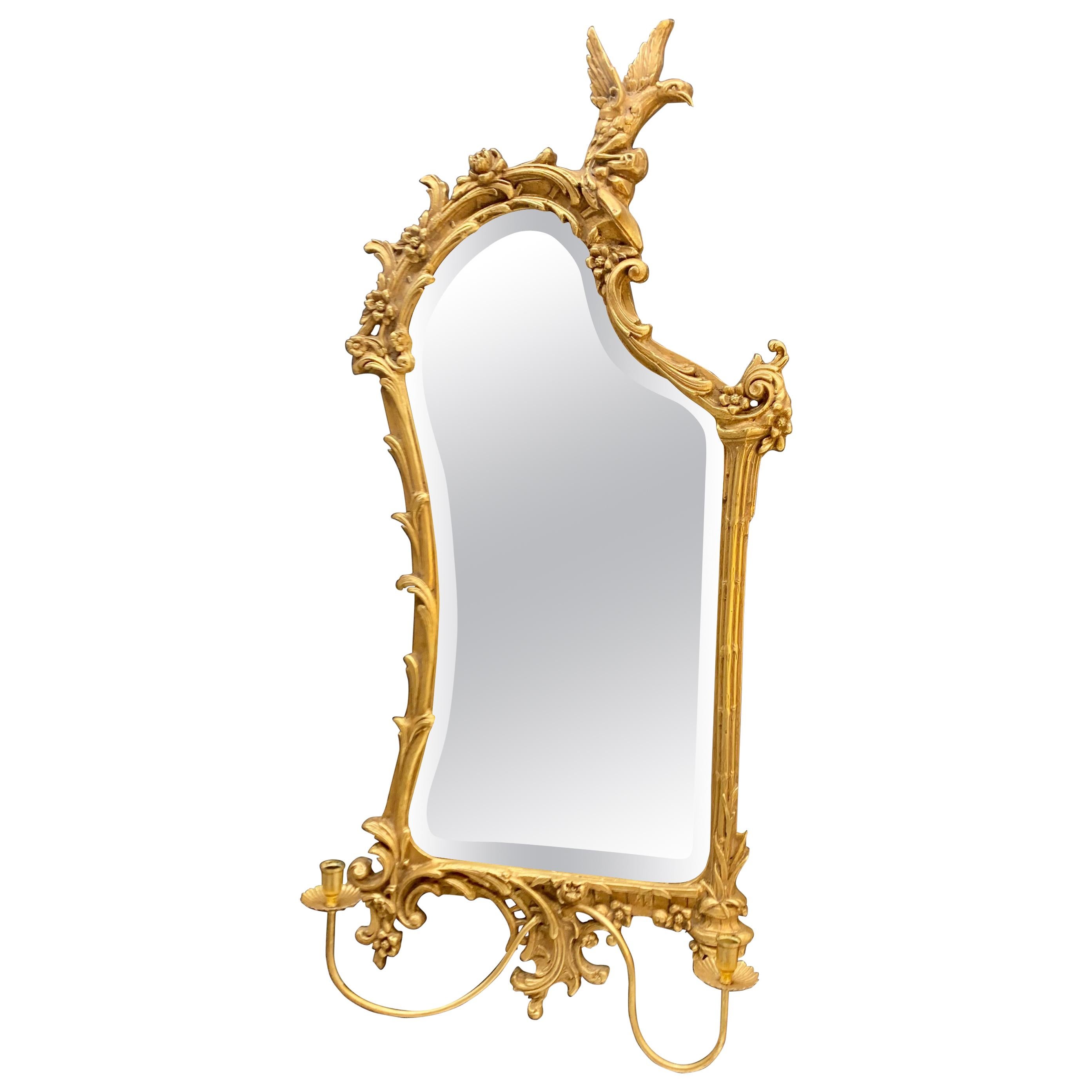 This gorgeous Roccoco mirror has a companion mirror that we are listing separately on 1stDibs this week. The mirror was likely made in the early part of the 20th century but in the same Italian region, and appear to have a more Japanese influence in