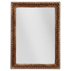 Specchio da parete con cornice rococò dorata