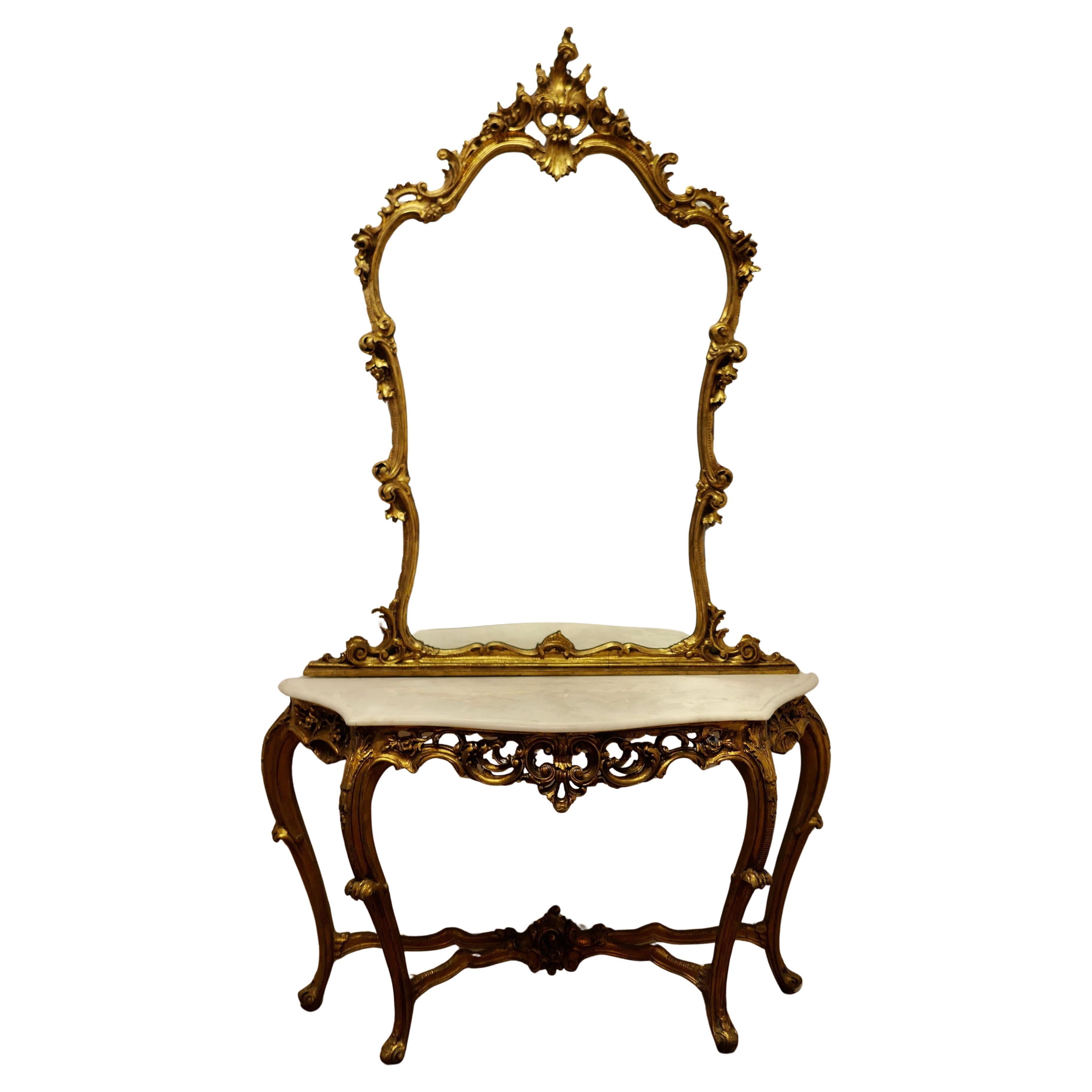 Conjunto de consola y espejo de madera dorada rococó Un conjunto muy raro en venta