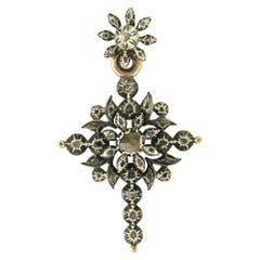 ROCOCO Gold and silver pendant in the shape of a cross set with rose-cut diamond