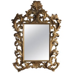 Miroir italien rococo avec cadre sculpté de couleur or et feuilles d'acanthe