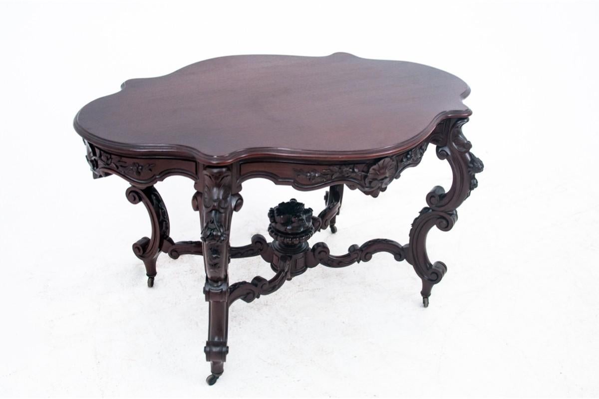 Rococo Revival Rococo mahogany table, France, circa 1870. For Sale