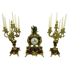 Rococo Mantel Clock with Two Candelabra Cherry Marble Gilded Bronze, circa 1880