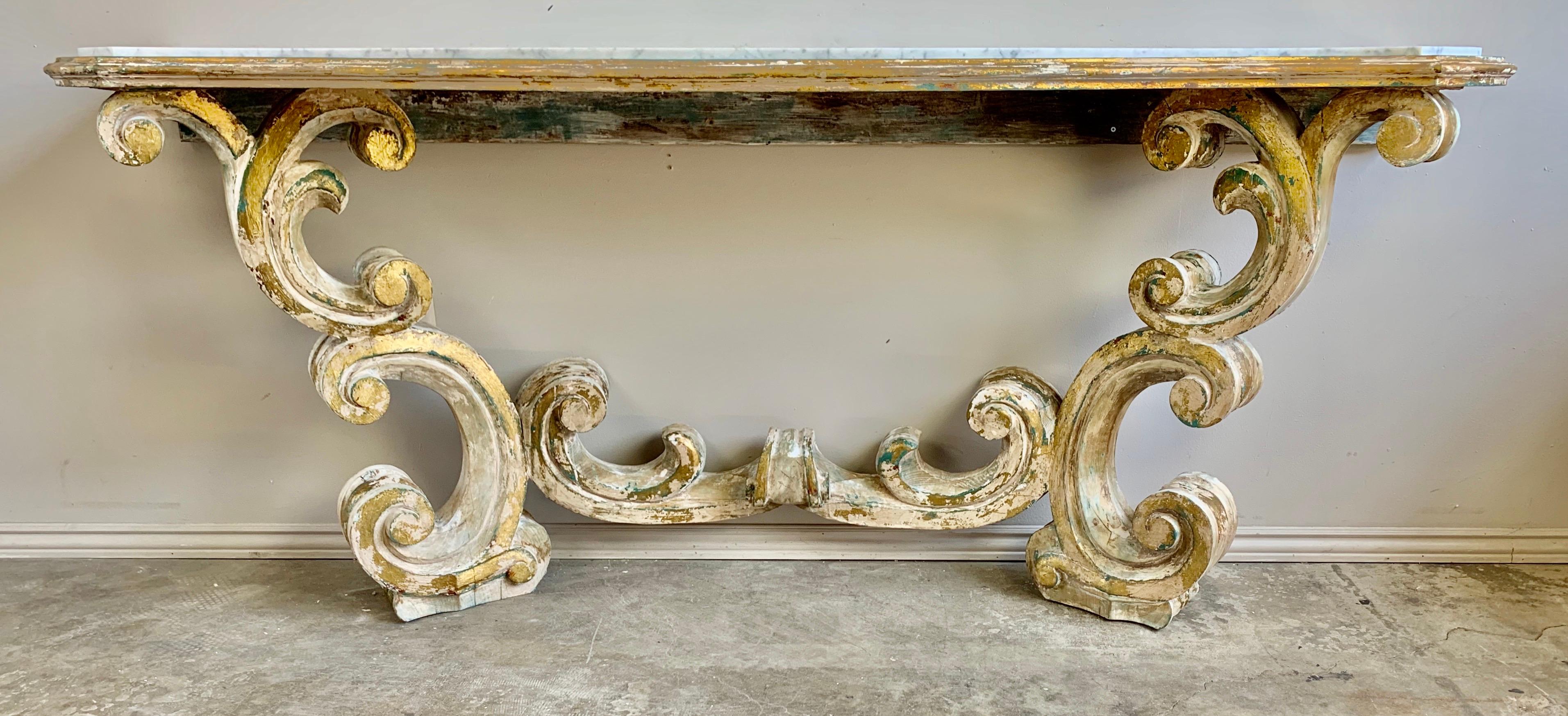 Italian Rococo Painted Carved Parcel Gilt Console with Carrara Marble Top