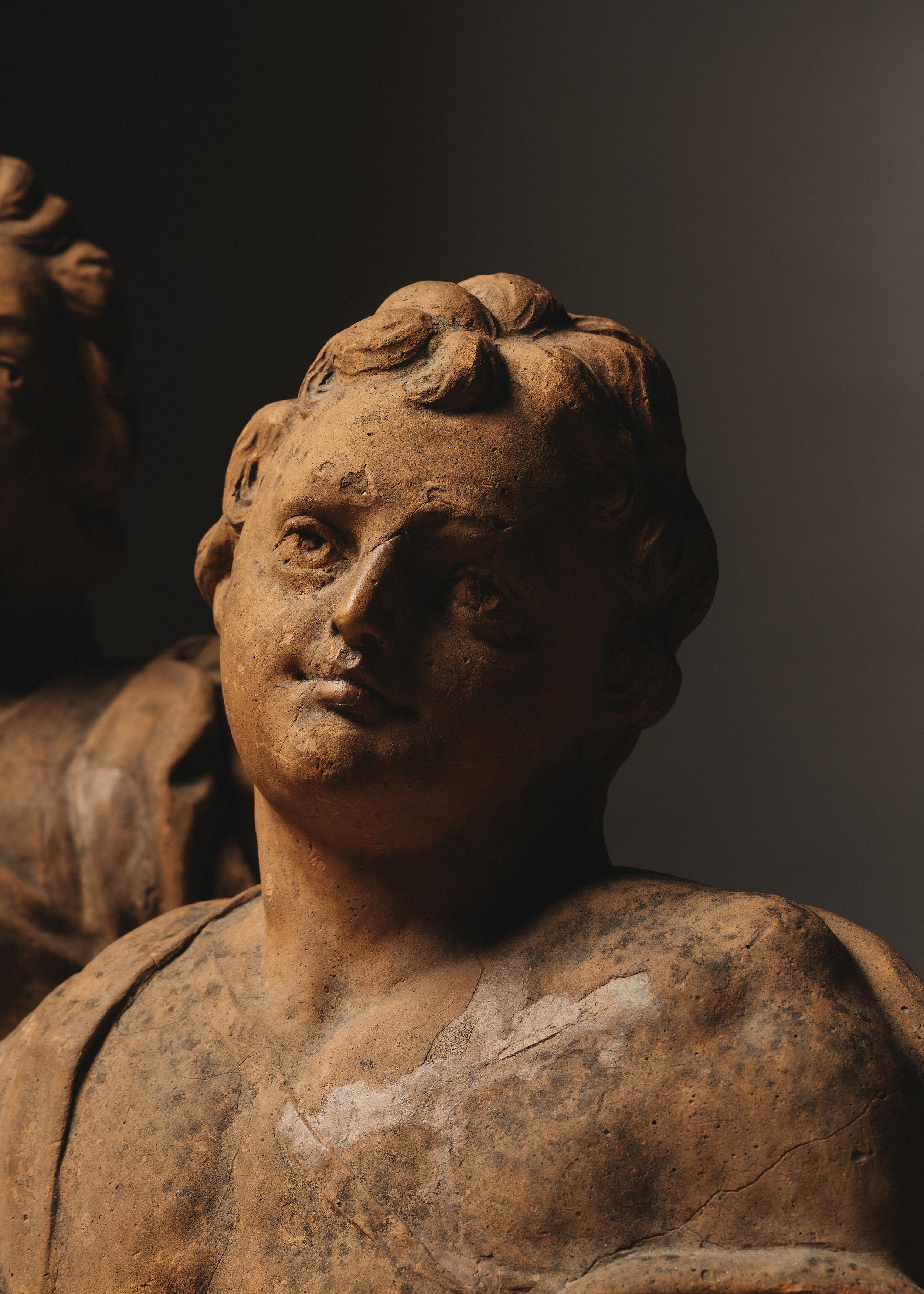 Transport your imagination to the splendor of the 18th century with our captivating pair of terracotta busts, straight from the French elegance of the era. These delicate figures capture the essence of nobility and the distinctive charm of the