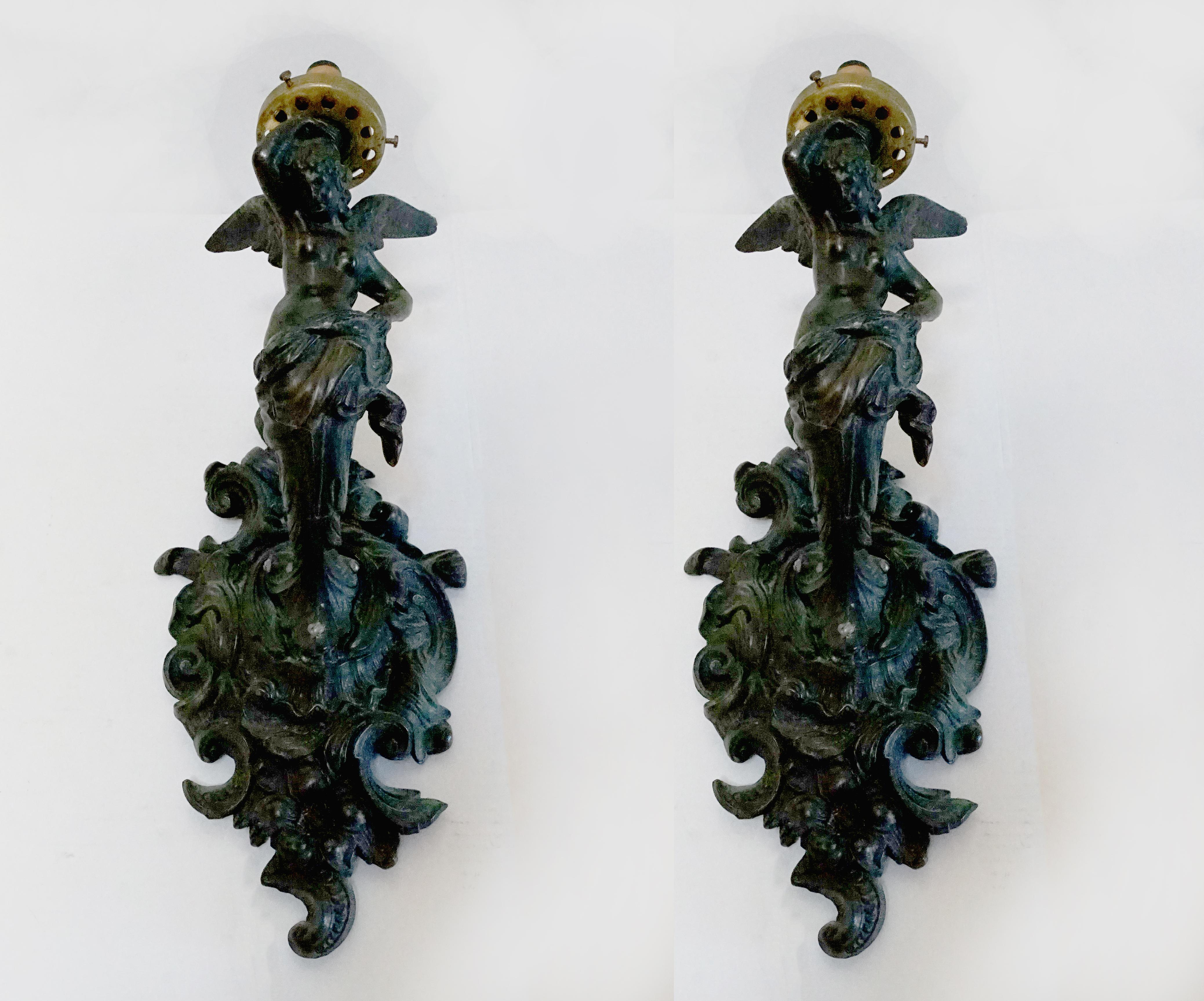 This pair of Rococo Revival cast bronze figural sconces attracted attention at an estate sale auction in Los Angeles. We found them irresistible. We are still scouring the pieces intermittently for a mark, but our appraiser is confident they are