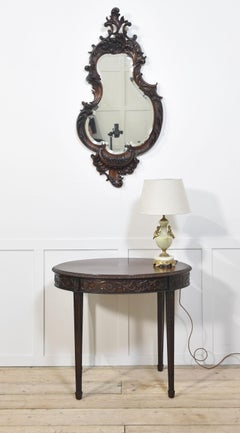 Rococo Revival carved mahogany wall mirror