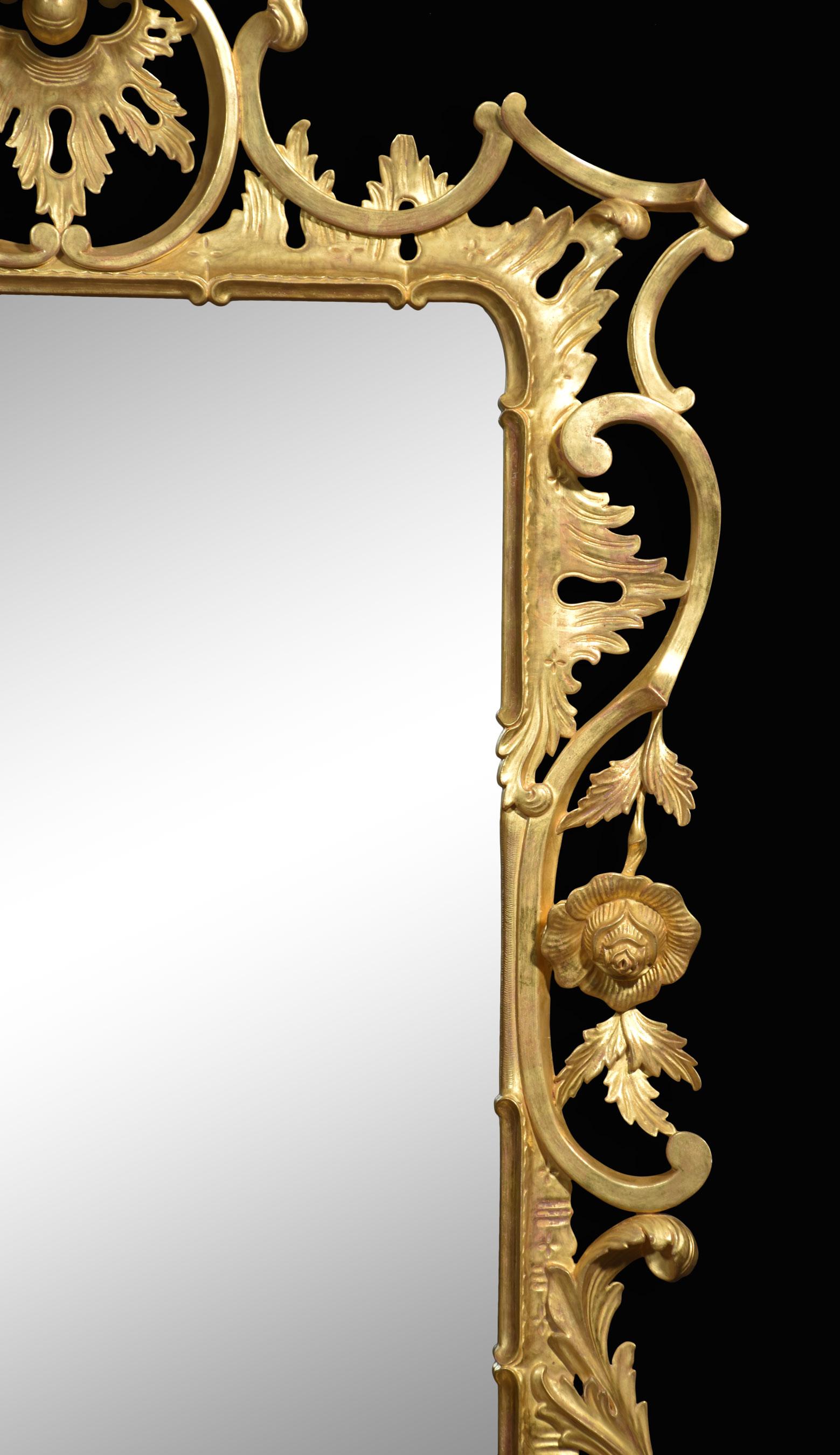 Giltwood wall mirror the original rectangular mirror plate encased in a pierced and carved giltwood frame with leaf and scroll decoration.
Dimensions
Height 69 Inches
Width 42 Inches
Depth 4 Inches