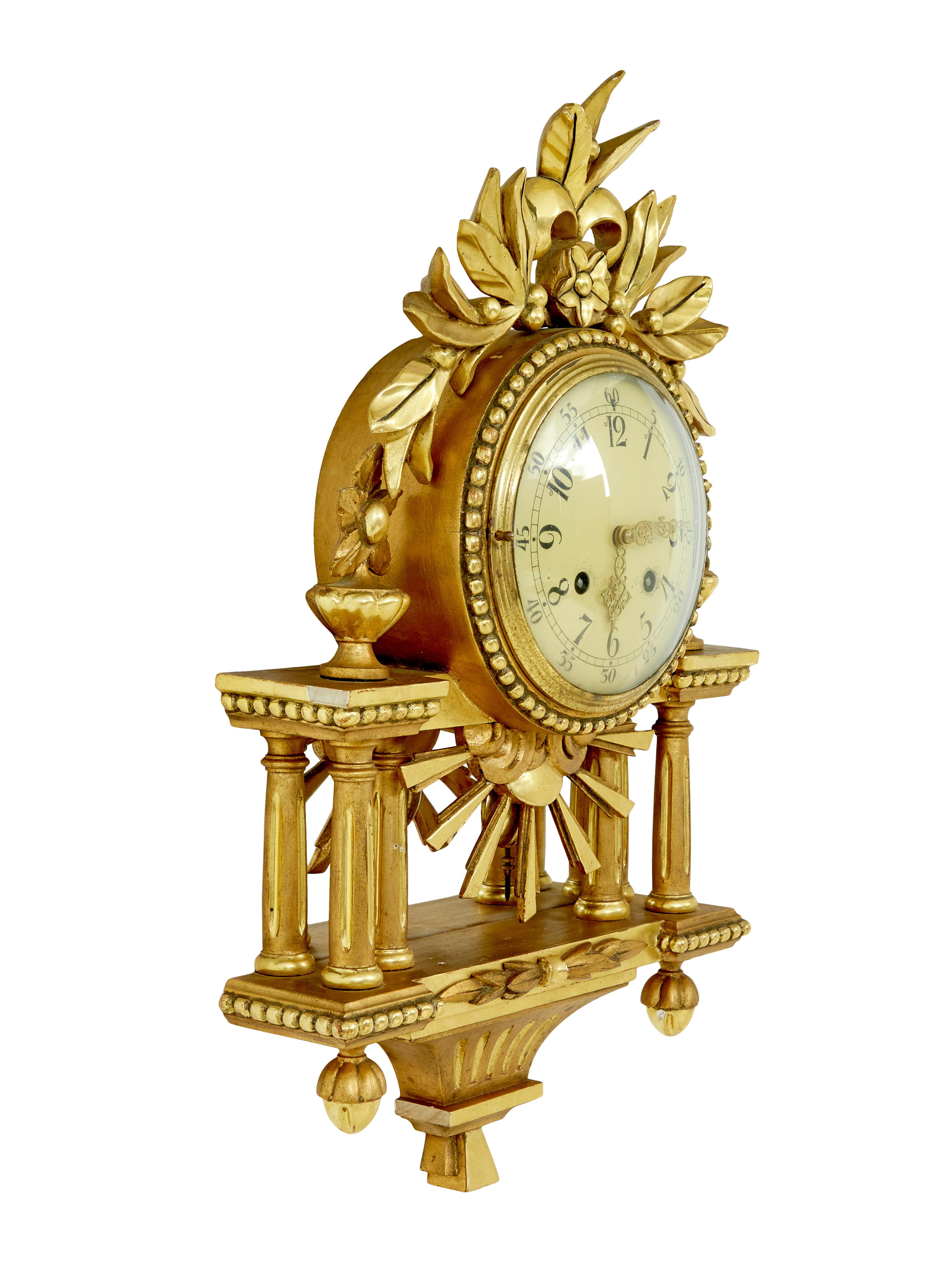 Swedish rococo revival gilt wall clock by westerstrand circa 1950.

Fine quality rococo influenced clock by well known swedish maker westerstrand.

Fitted with a twin train 8 day movement and original pendulum. Enamel clock face with arabic numerals