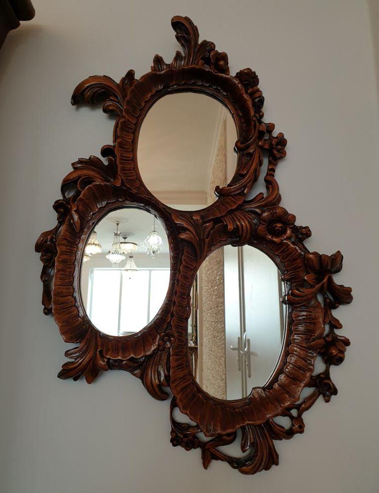 Unusual, Rococo Revival style console with a very subtle three-part mirror (the mirror consists of three independent, autonomous mirrors).

Particularly noteworthy is the deep, 