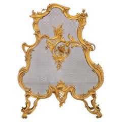 Pantalla para chimenea de latón dorado estilo renacimiento rococó