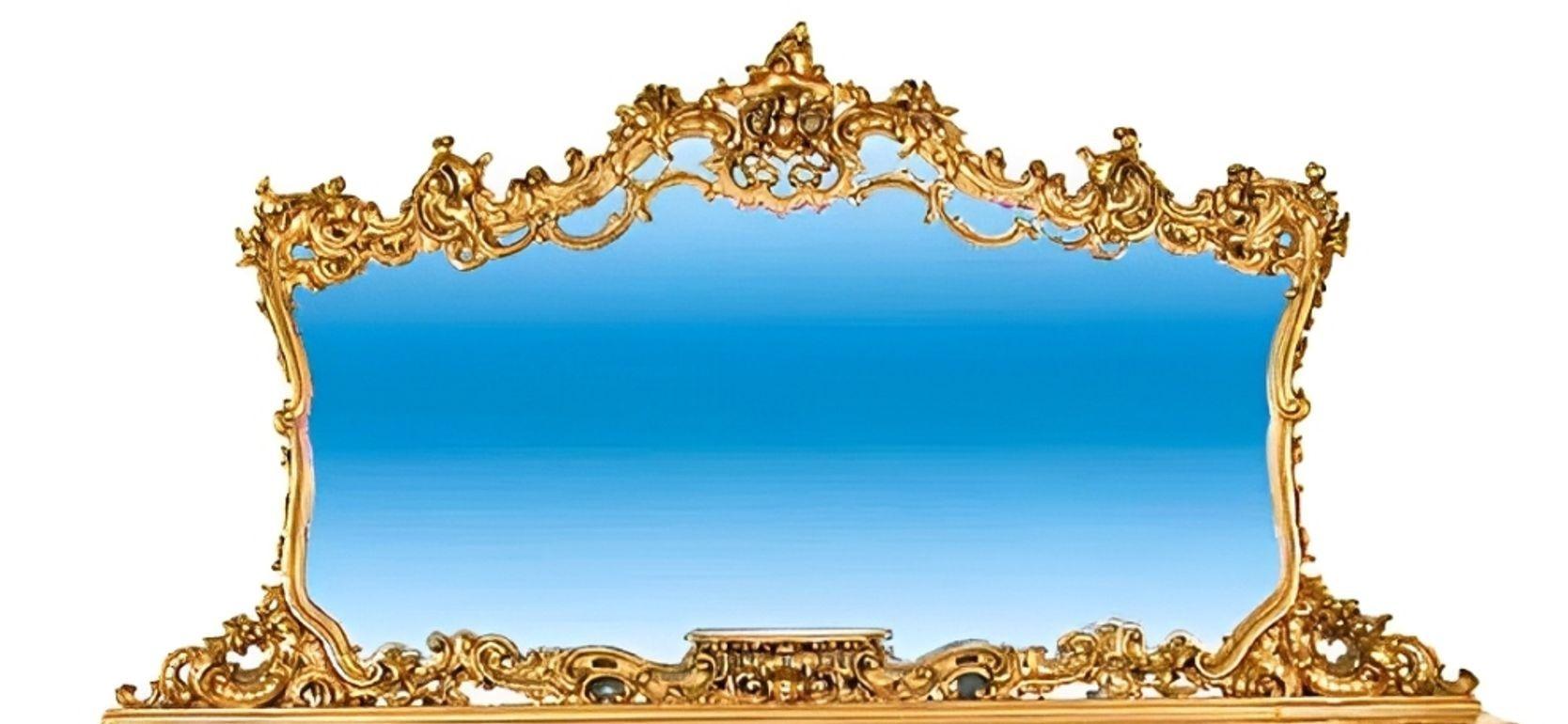 An opulent Italian Rococo-style grand sideboard from the 1920's, featuring an attached oversized gilded mirror and exquisitely carved detailing throughout. Crafted beautifully, this statement piece showcases the ornate elegance and dramatic flair of