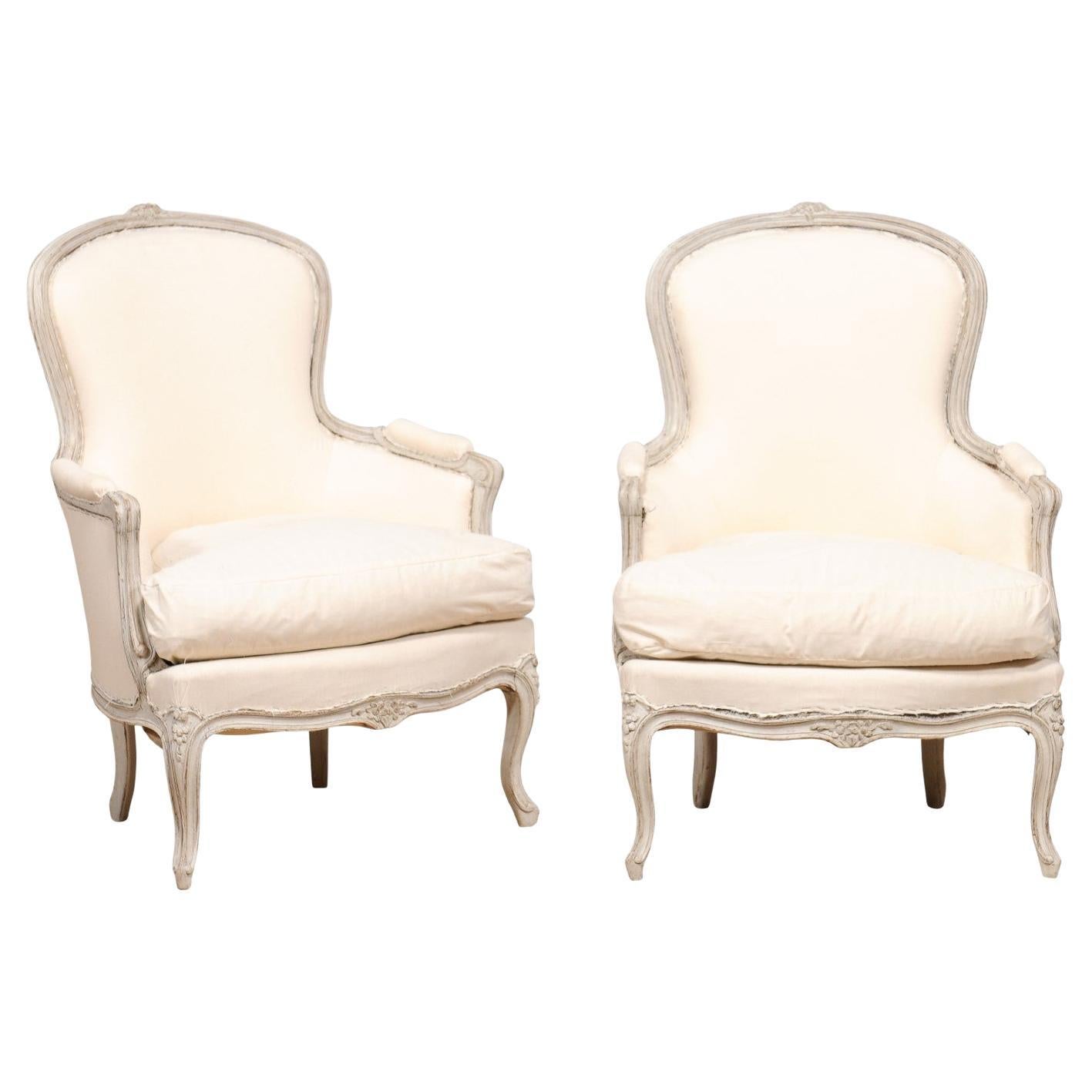 Rococo Style 1890s Swedish Light Grey Painted and Carved Bergères Chairs, a Pair