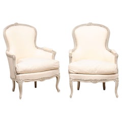 Antique Rococo Style 1890s Swedish Light Grey Painted and Carved Bergères Chairs, a Pair