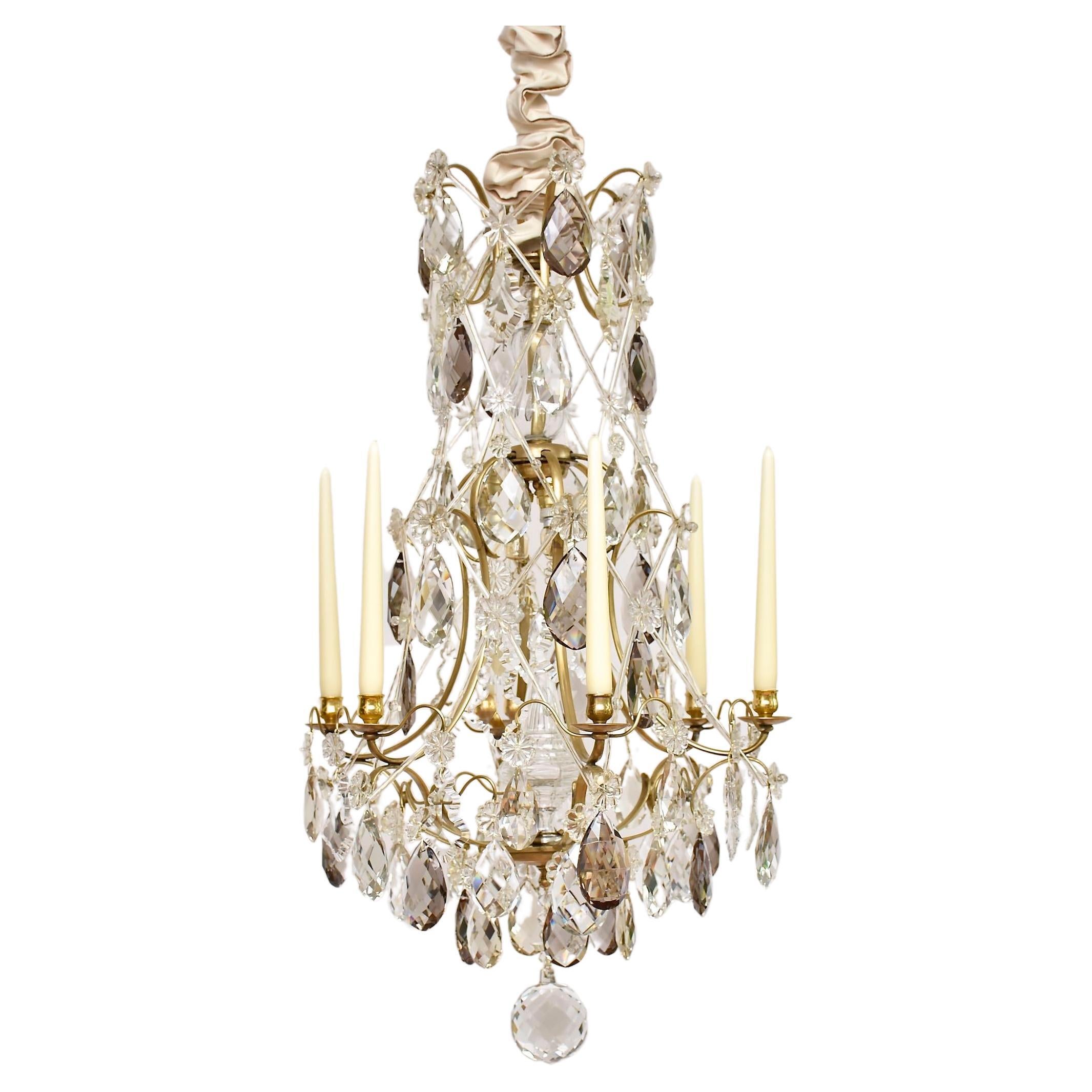 Rococo style brass and crystal chandelier For Sale