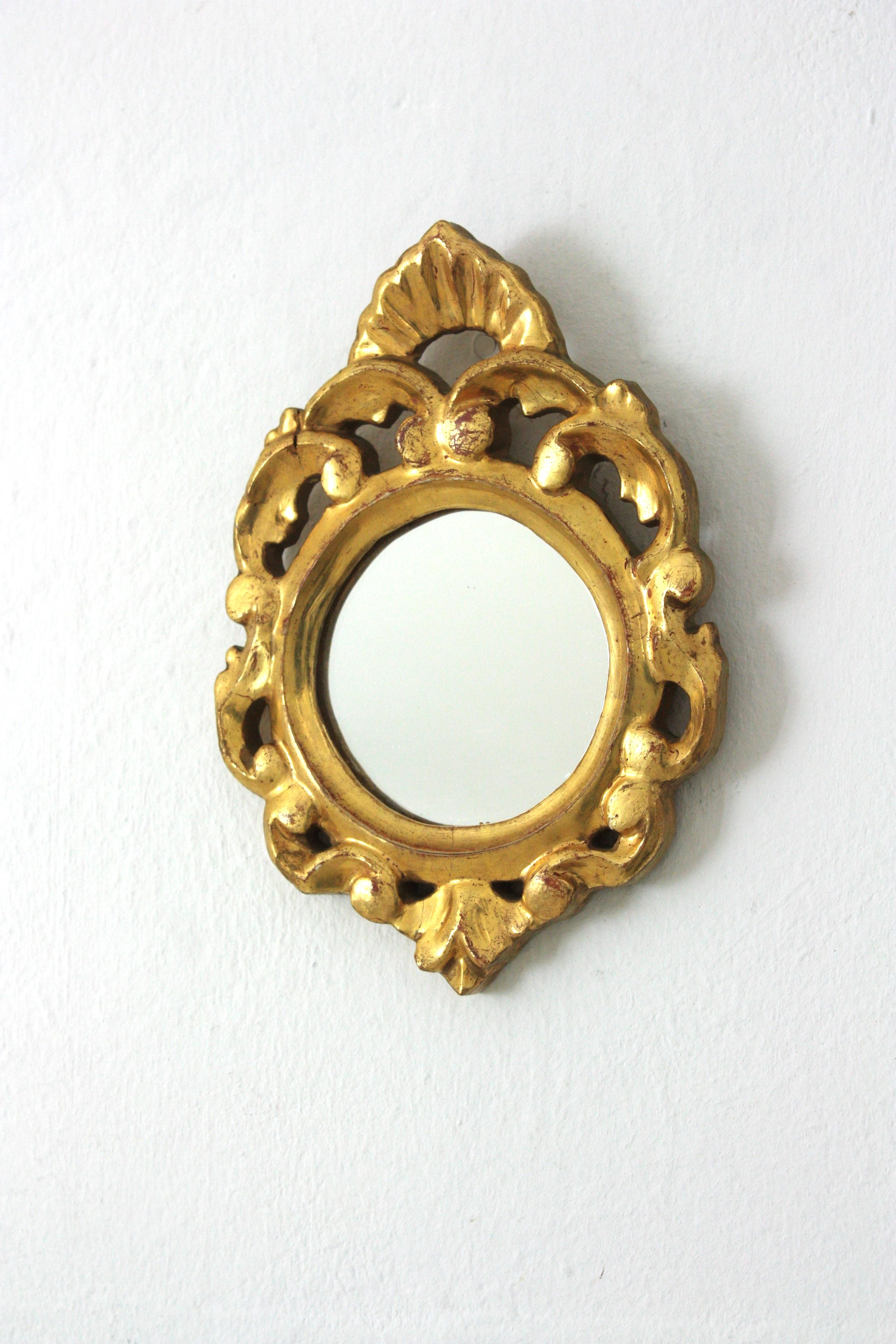 Rococo mini sized mirrors, giltwood, gold leaf, Spain, 1930s
Small scale Rococo style round mirror featuring carved gold gilt frame.
Unusual piece due to its size.
Nice aged patina showing its original gold leaf gilding.
Interesting for collectors