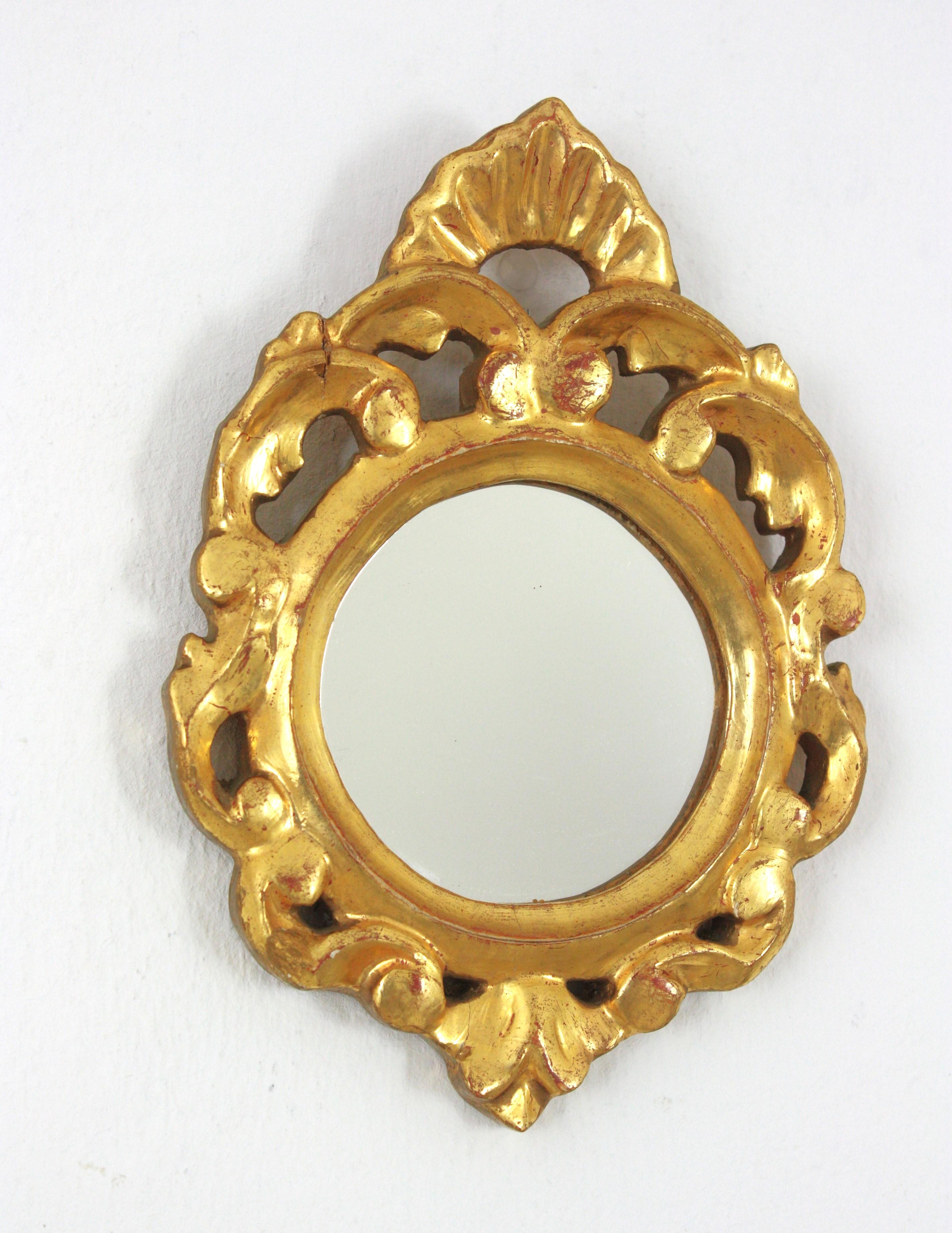 Spanish Rococo Style Carved Giltwood Miniature Wall Mirror For Sale