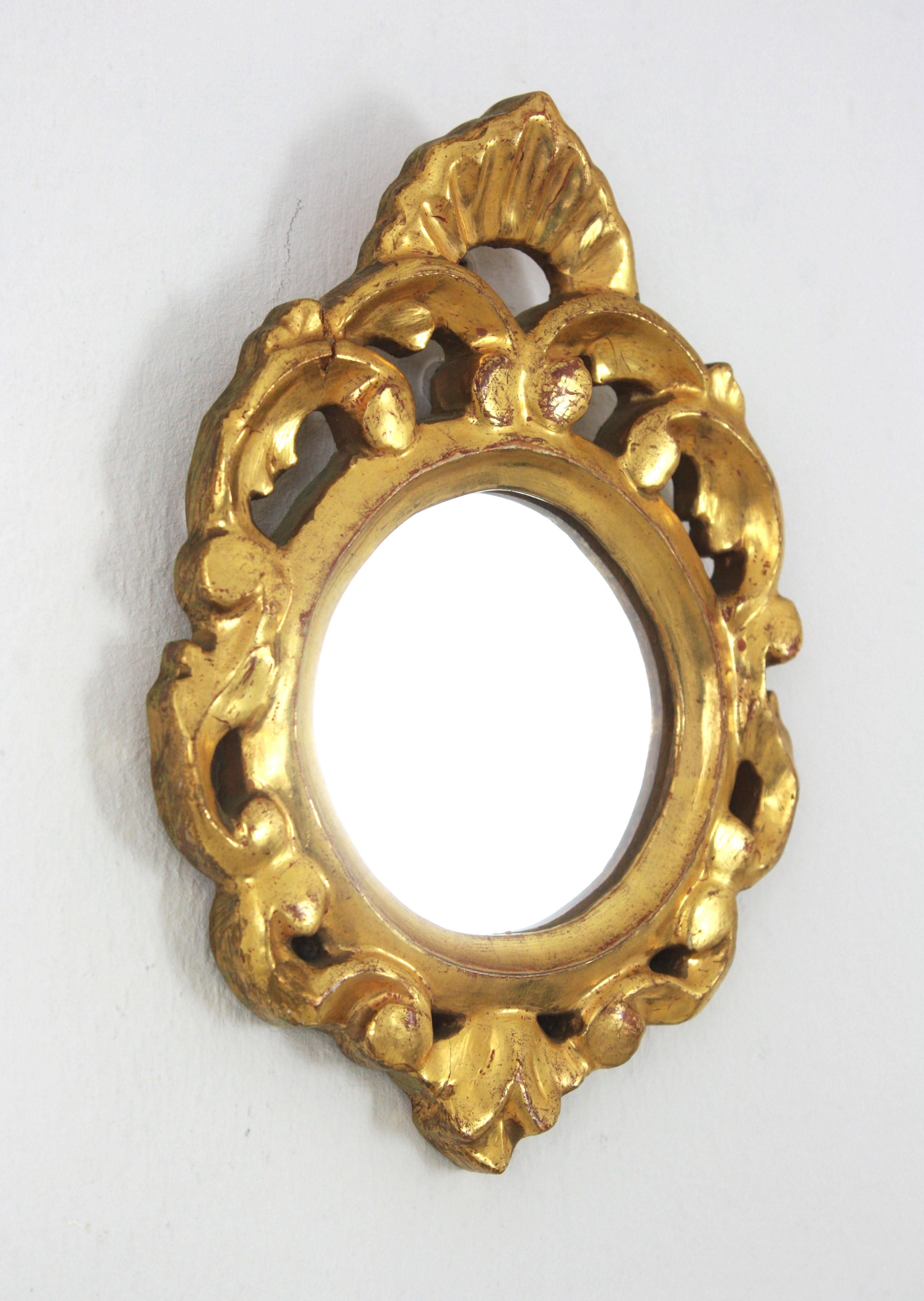 Hand-Carved Rococo Style Carved Giltwood Miniature Wall Mirror For Sale