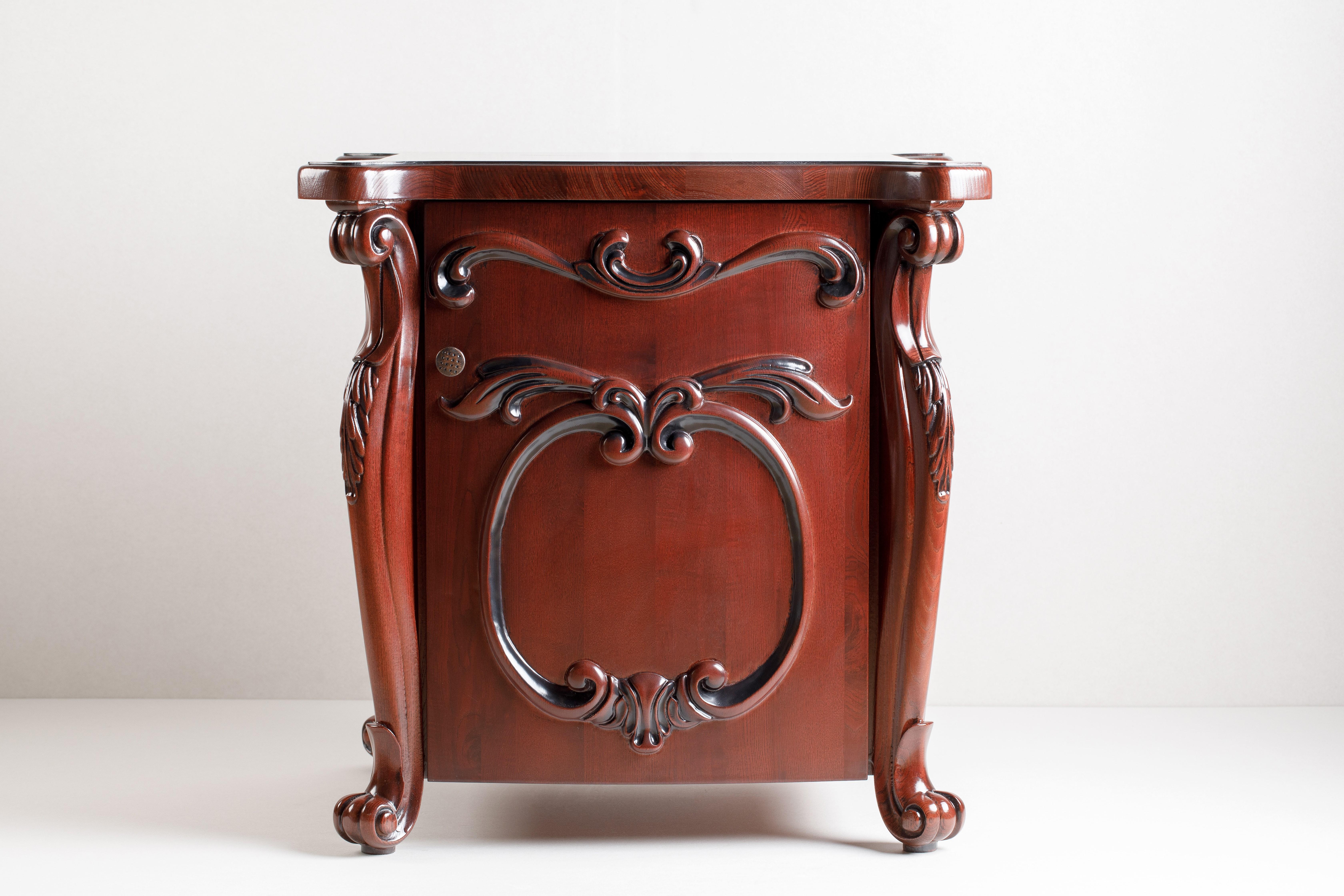 CARVED DOOR NIGHTSTAND
New – not previously owned. Shows absolutely no signs of wear.

Dimensions
H 24.80 in. x W 24.80 in. x D 21.65 in.
H 63 cm x W 63 cm x D 55 cm

DATE OF MANUFACTURE 2019

The finest natural hard wood – ASH

The Rococo style is