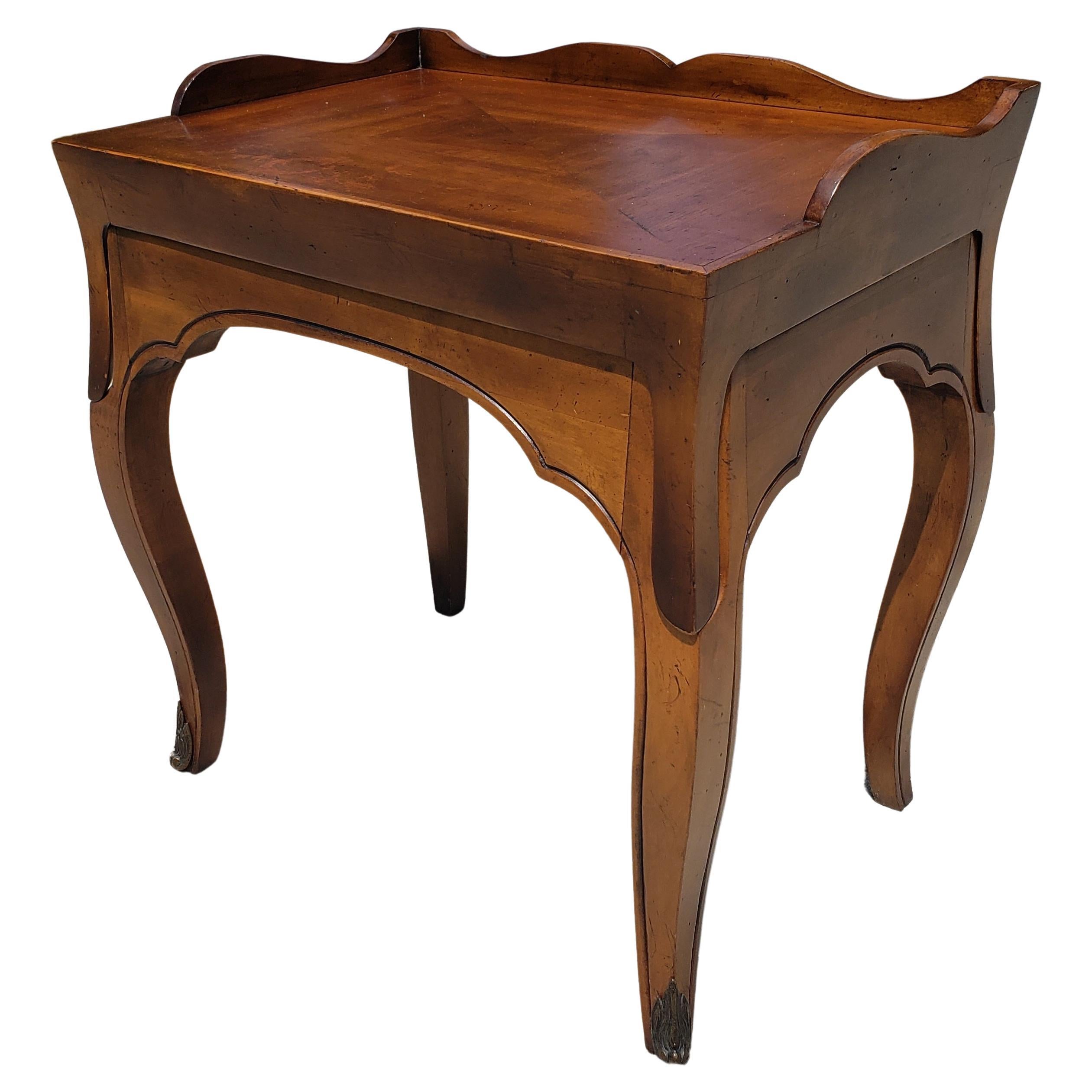 A rare Rococo Style Cherry Side Table with Removable footed Tray Top
measuring 24.75' in width, 17.75