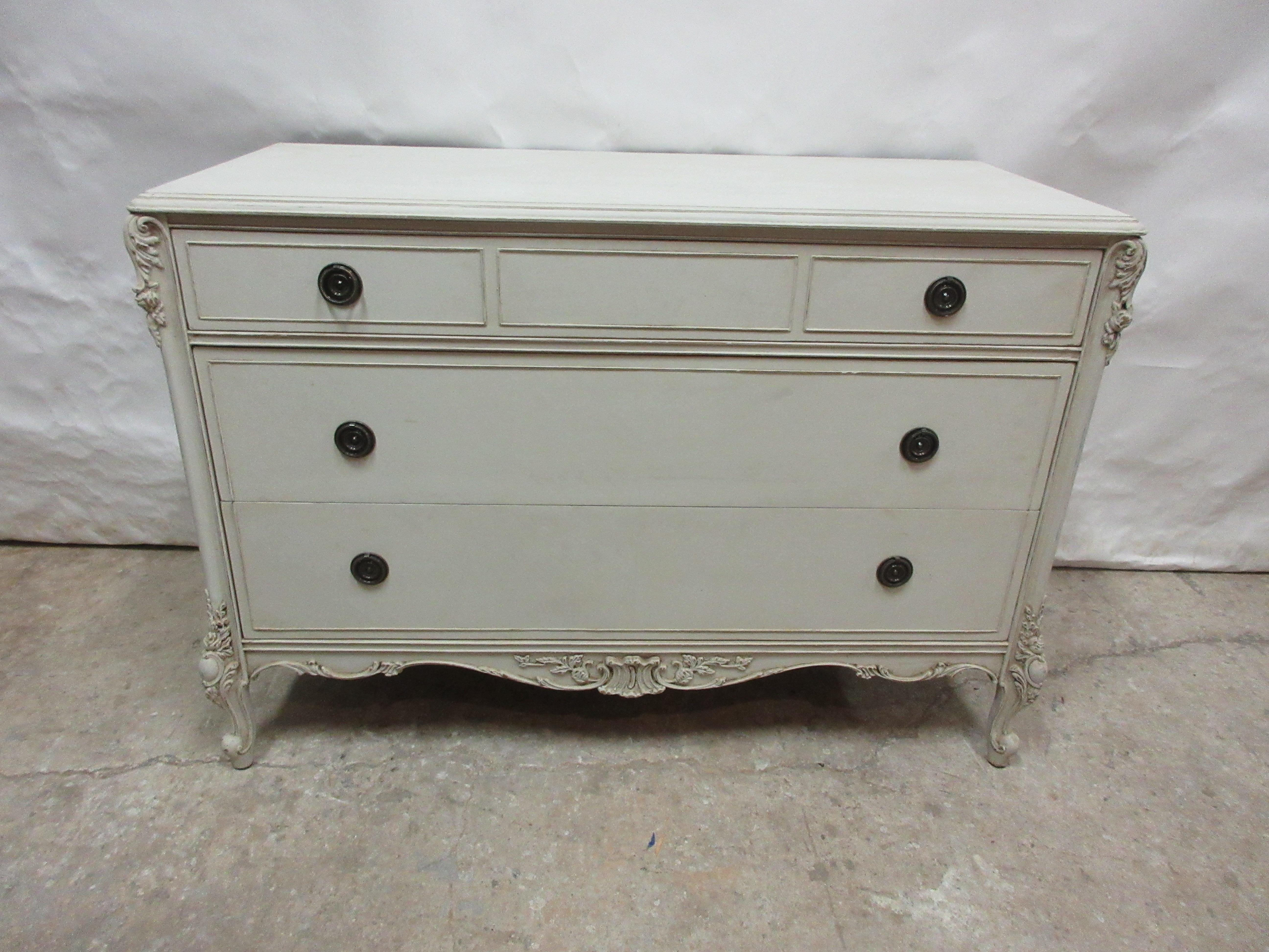 This is a unique Rococo style chest of drawers. Its been restored and repainted with Milk Paints 