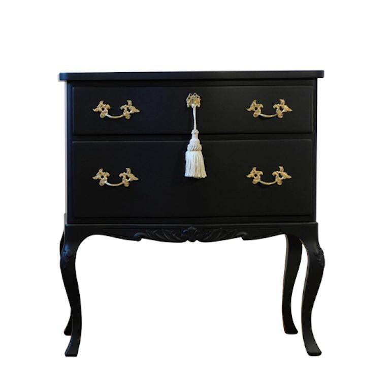 Rococo style chest with 2 drawers and modern flat black finish. Original brass fittings. 
Measures: Width: 62cm / 24.4