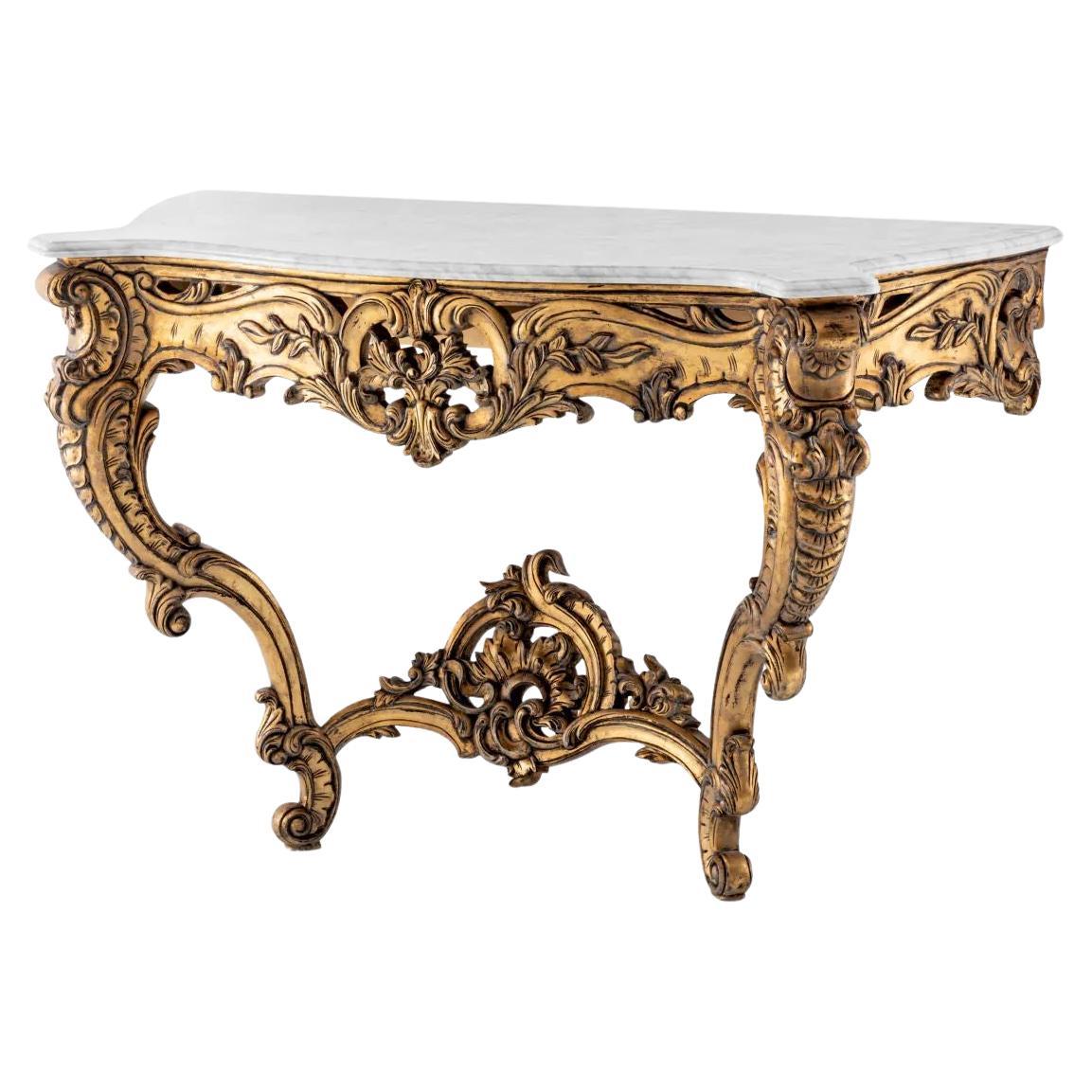 Table console de style rococo en or antique et marbre blanc