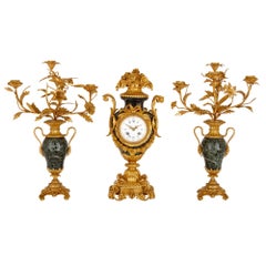 Rococo Style Gilt Bronze and Marble Three-Piece Clock Set