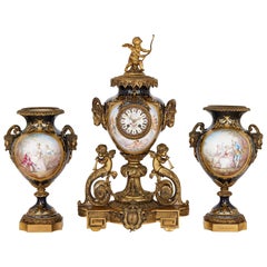 Rococo Style Gilt Bronze and Sèvres Style Porcelain Clock Garniture