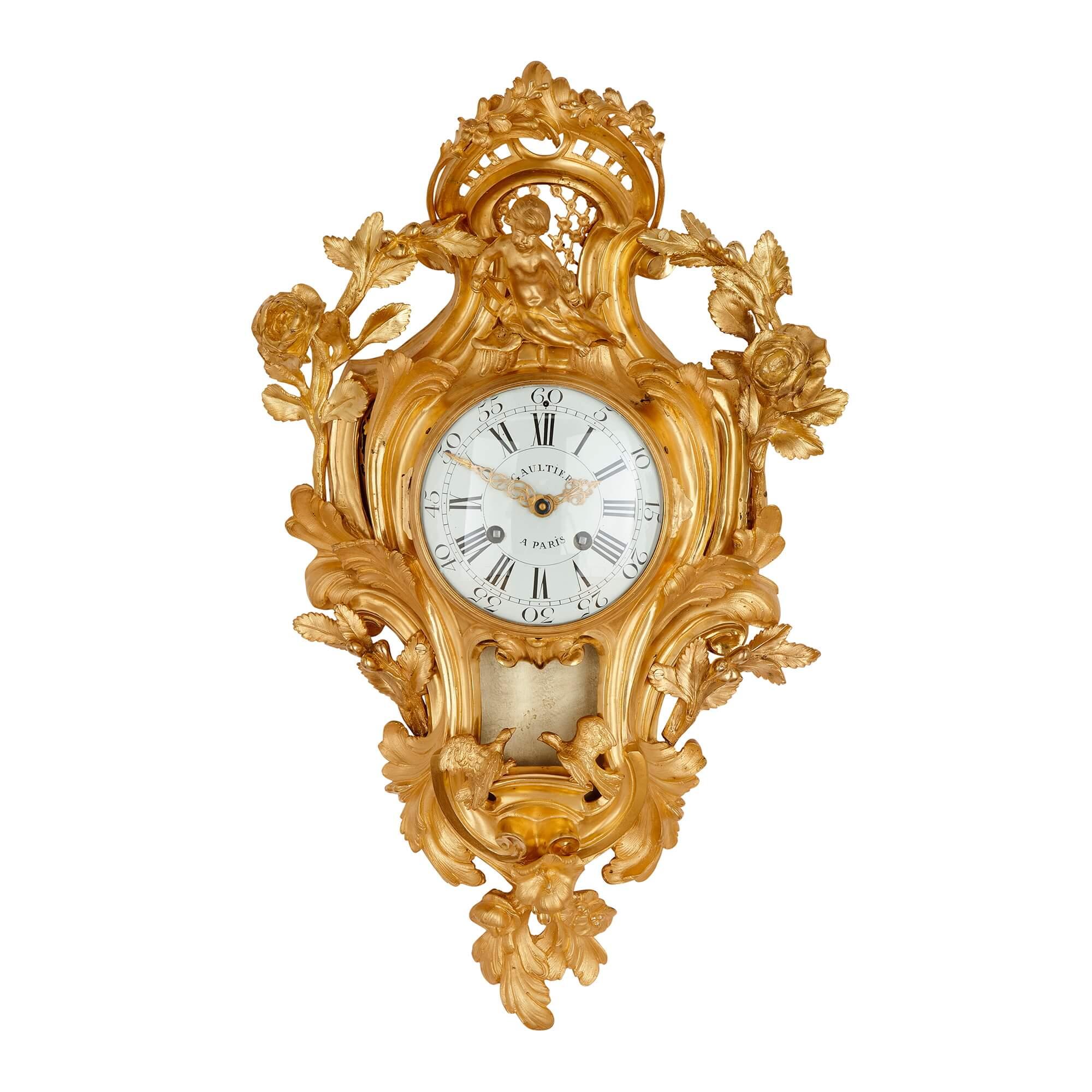 In their elaborate use of C-scrolls, putti figures, stylised acanthus leaves and flowers, this clock and barometer are clearly Rococo in their style. The Rococo came into fashion in France during the reign of King Louis XV (1710-74) and because of