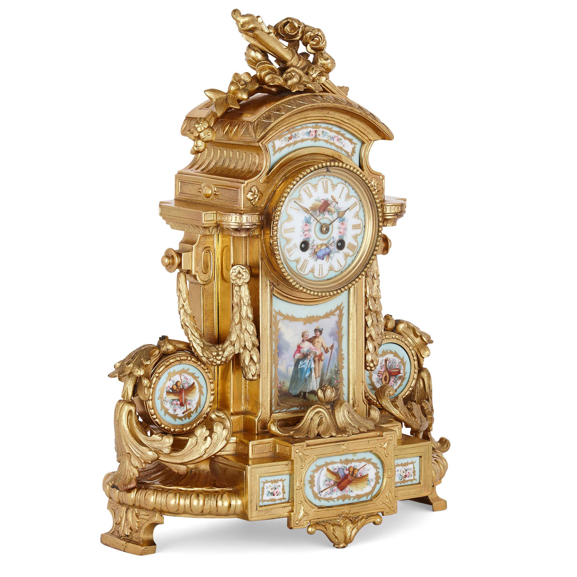 Rococo style gilt bronze mantel clock with Sèvres style porcelain plaques
French, late 19th Century
Measures: Height 45cm, width 32cm, depth 15cm

This fine mantel clock is a charming demonstration of the Rococo style. The clock features a gilt