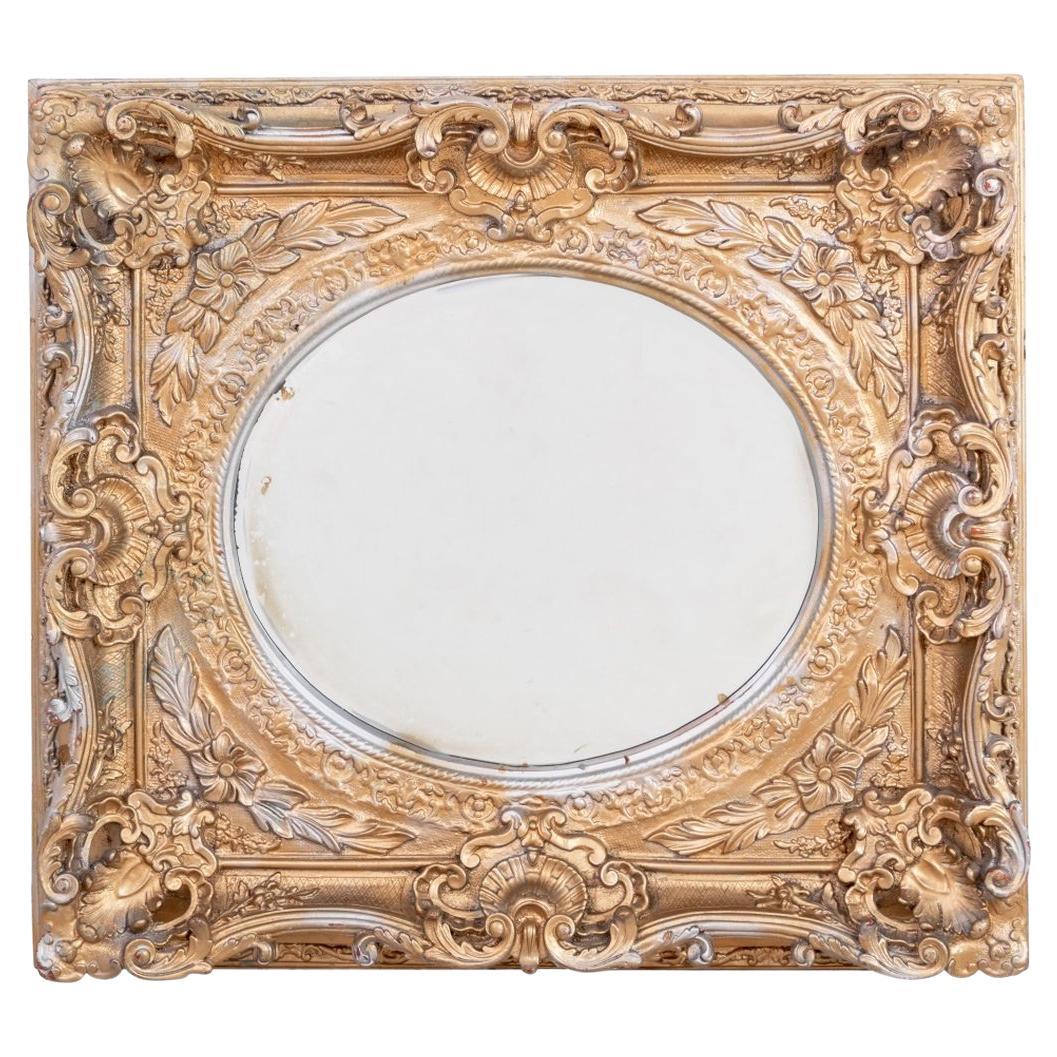 Miroir de composition de style rococo, doré et argenté en vente