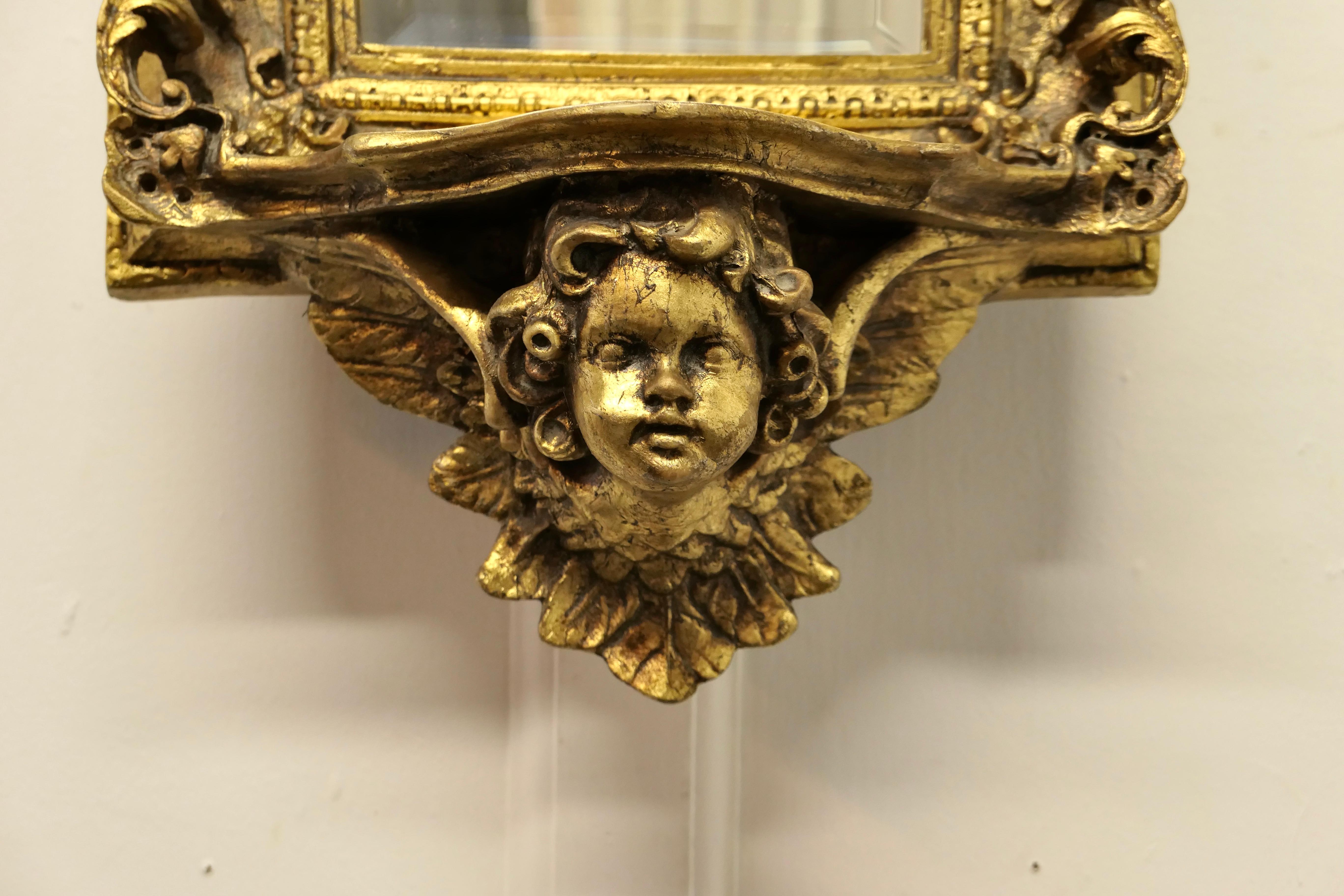 Rococo Style Gilt Wall Mirror with Putti and Shelf Bracket  In Good Condition For Sale In Chillerton, Isle of Wight