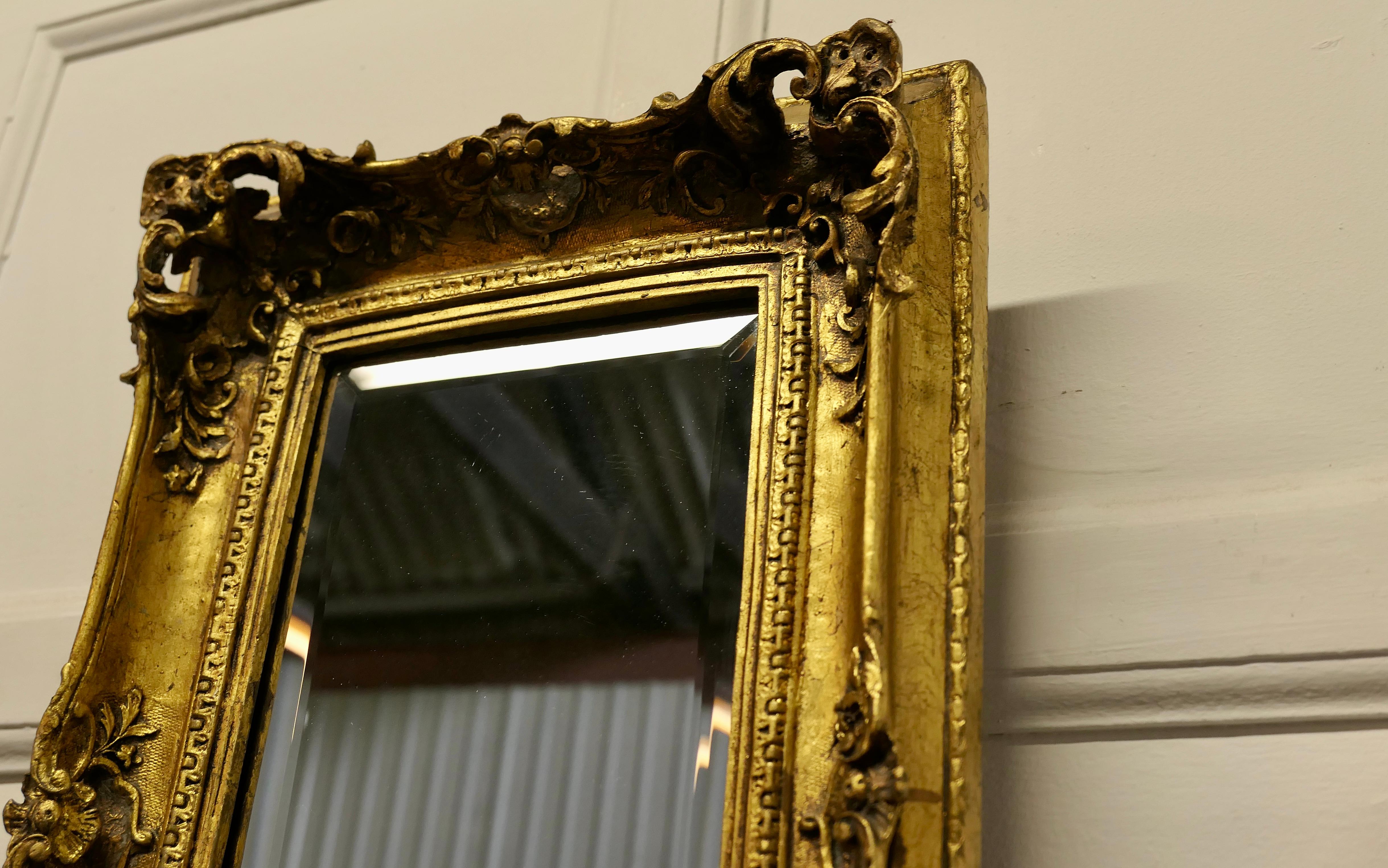 Composition Rococo Style Gilt Wall Mirror with Putti and Shelf Bracket  For Sale