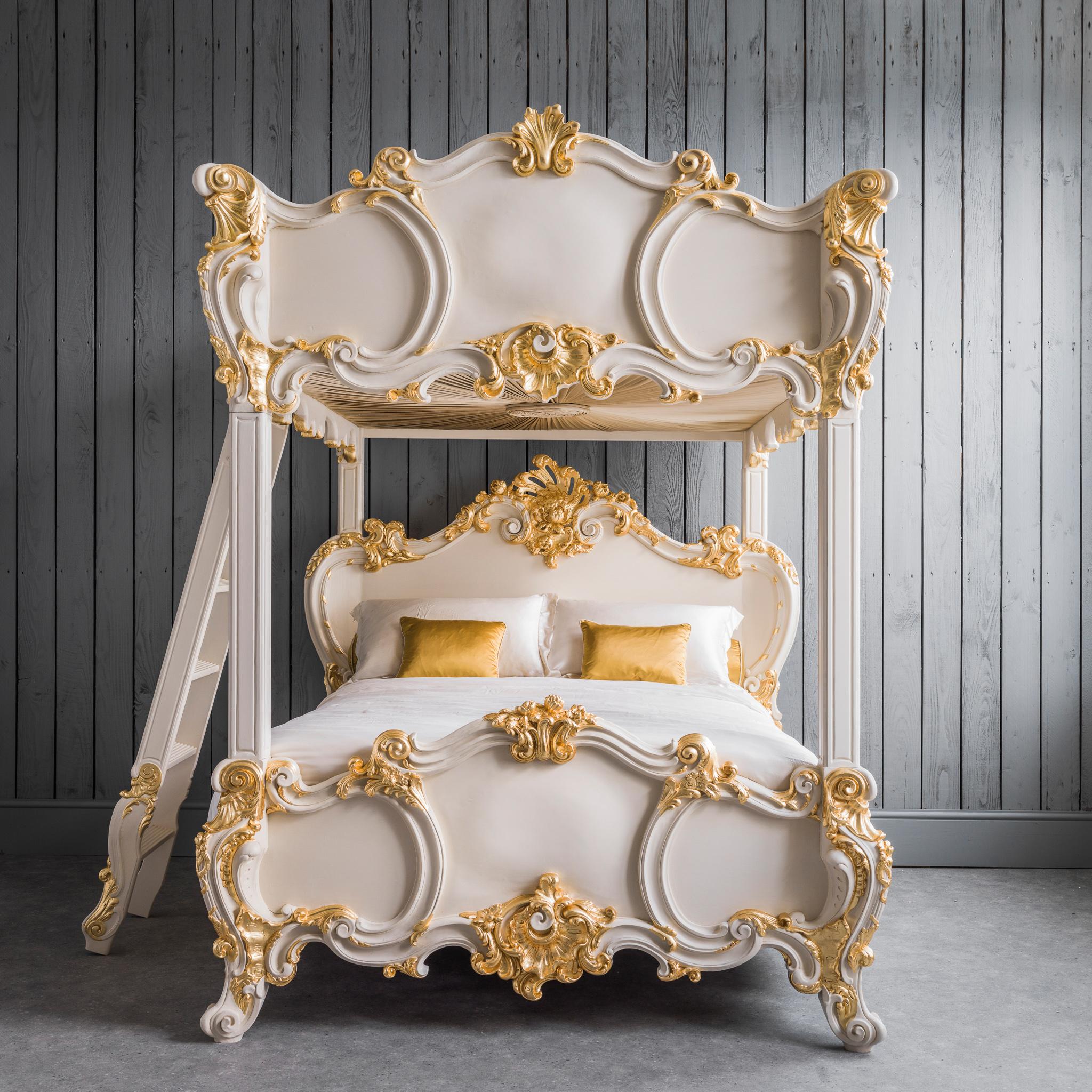 A unique design of master carving from La Maison London. A hand carved Four Poster bed frame, in the Rococo style, which also doubles as bunk bed. The top section has been designed to look like a canopy for when the top tier bed is not in use and so